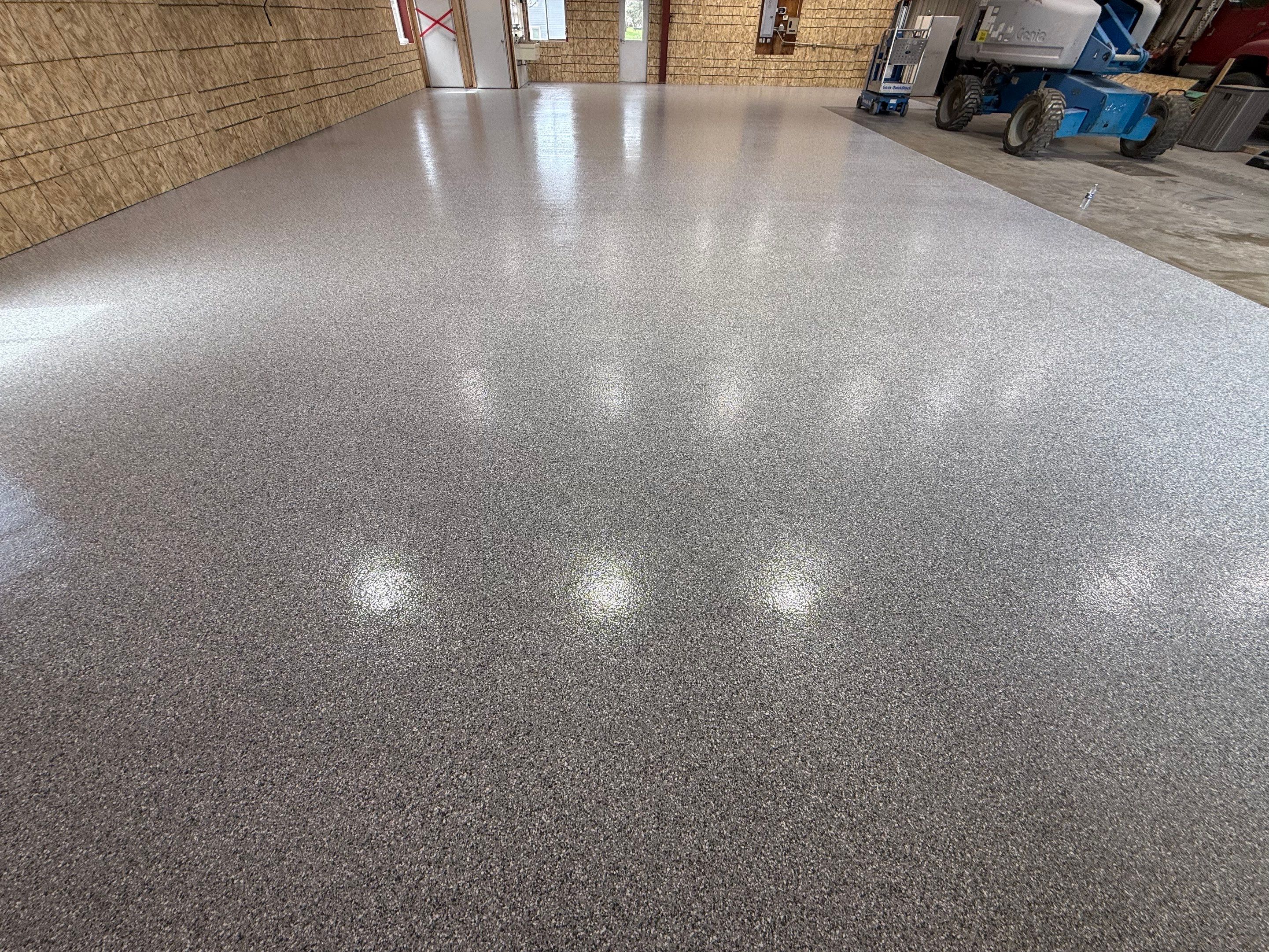 Custom Polyurea Shop Floor with Basketball Court Lines in Rock Valley by Select Painting, Coatings & Garage Cabinets