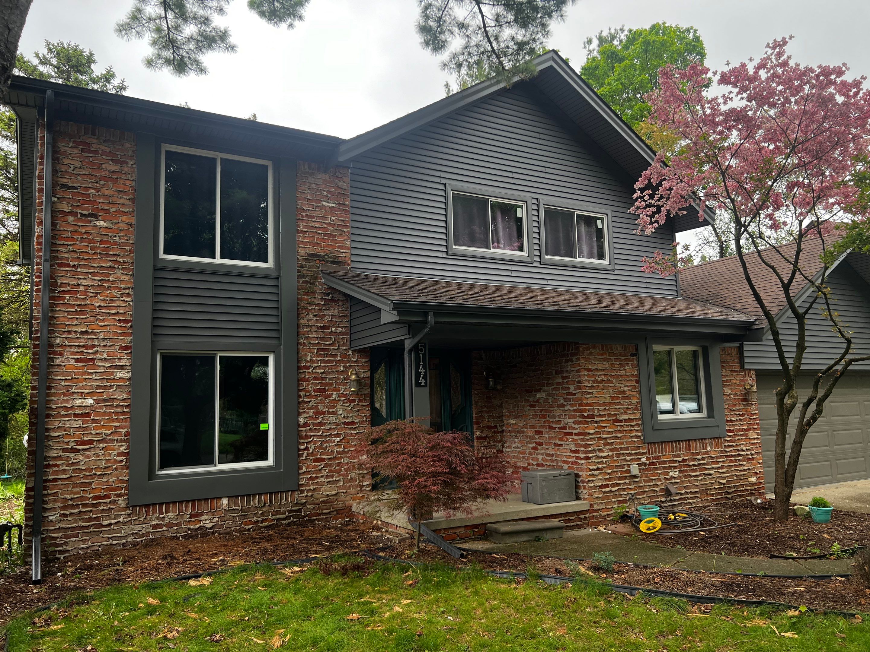 Siding Replacement  using Certainteed Monogram Vinyl D4" Smoky Gray color by Bloomfield Construction & Restoration