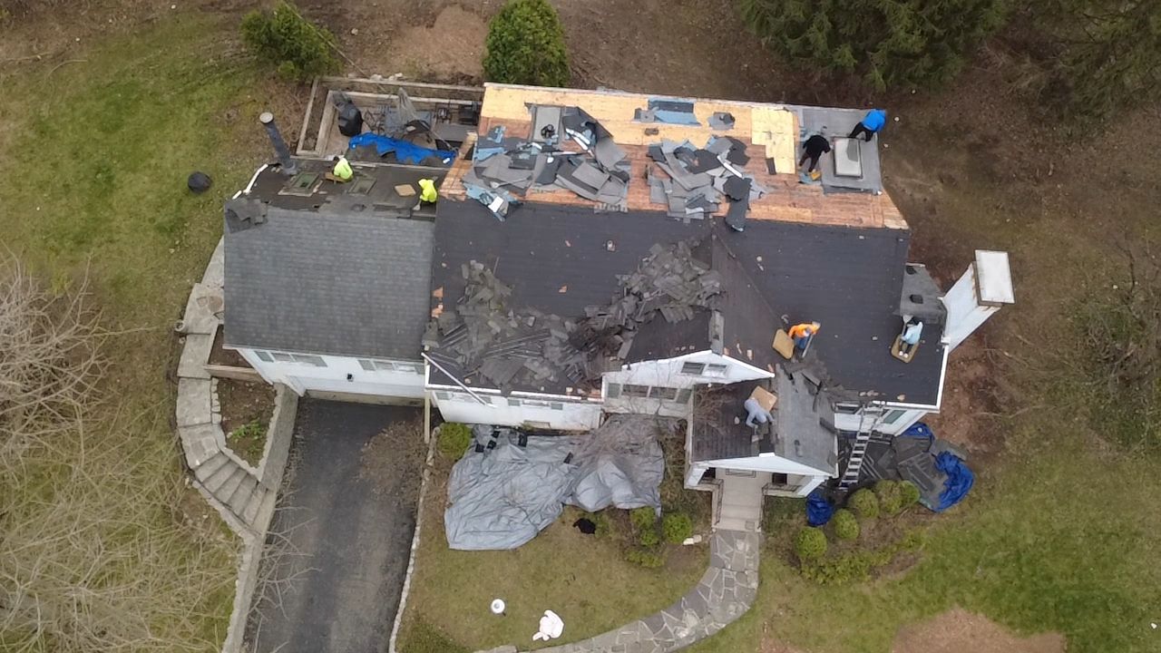 A gorgeous new roof to start on rebuilding the life in this home.  by Level Up Roofing and Restoration Services LLC