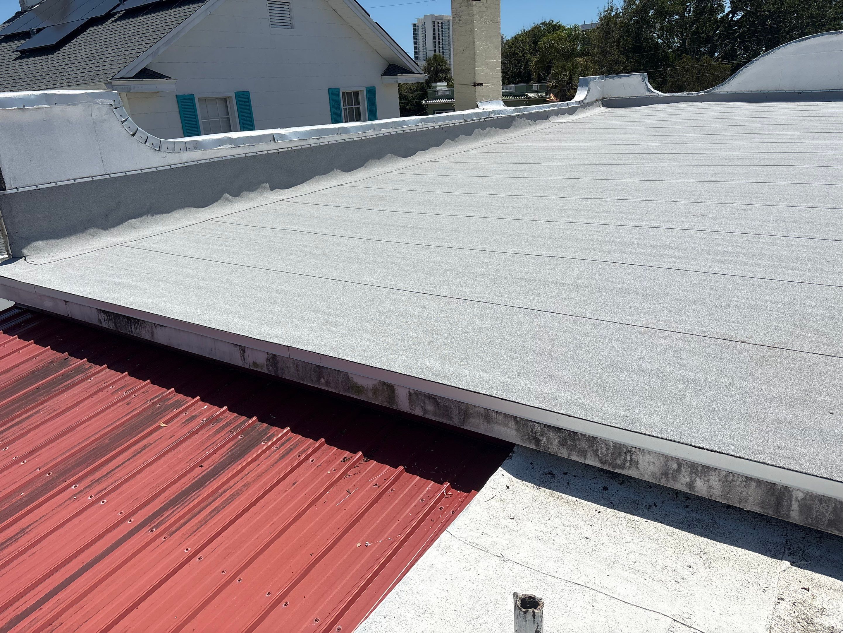 Flat Reroof Replacement Daytona Beach FL by Pinnacle Roofing Group