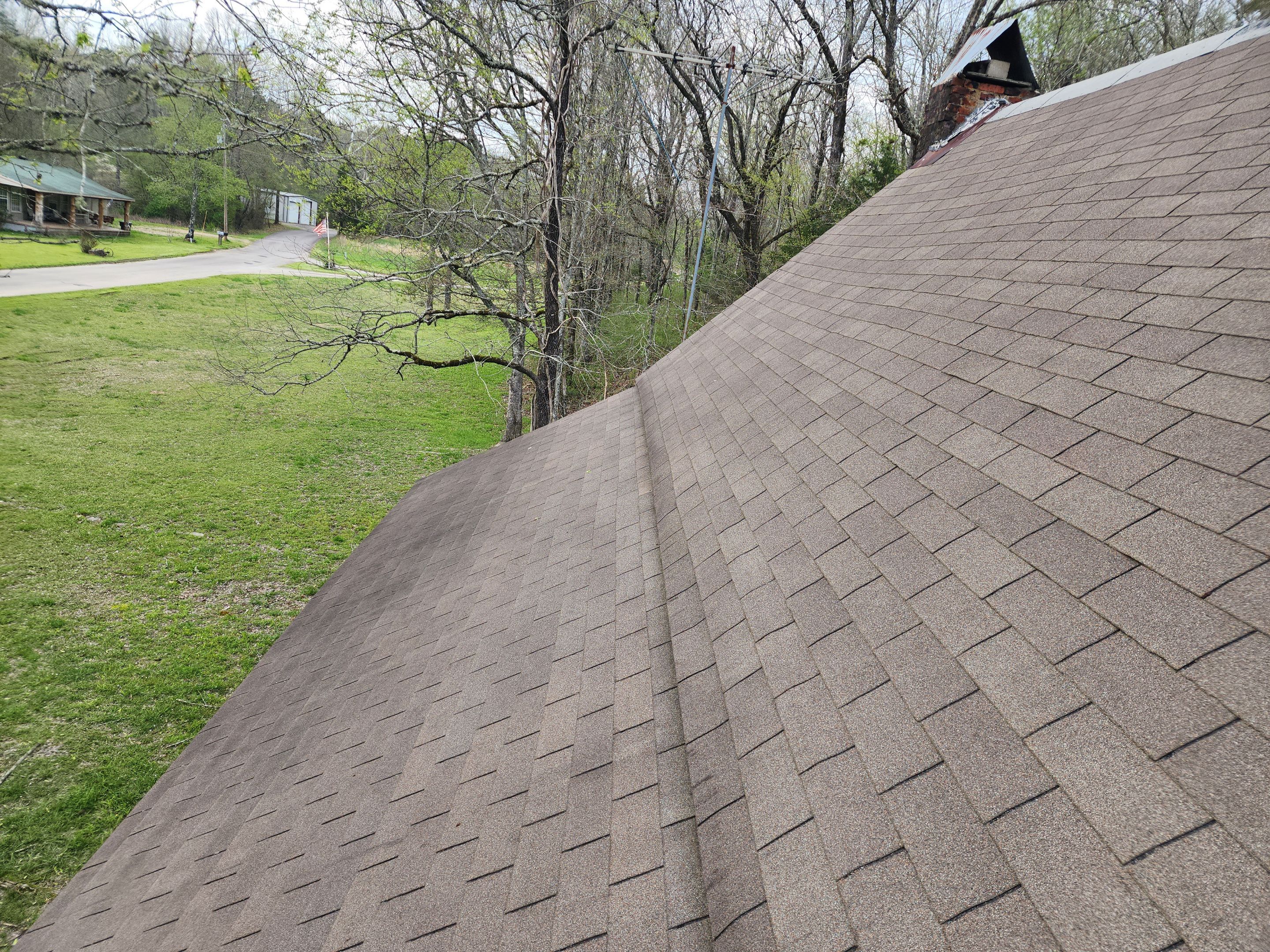 Residential Roofing Installation using 26 Gauge Colored Panels by Hostetler Roofing