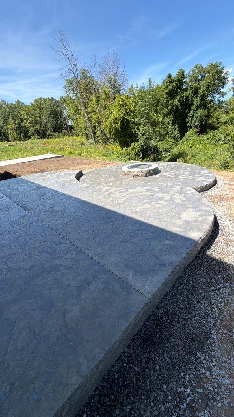 Oxford Slate Patio with Fire Pit by NG Masonry & Construction LLC