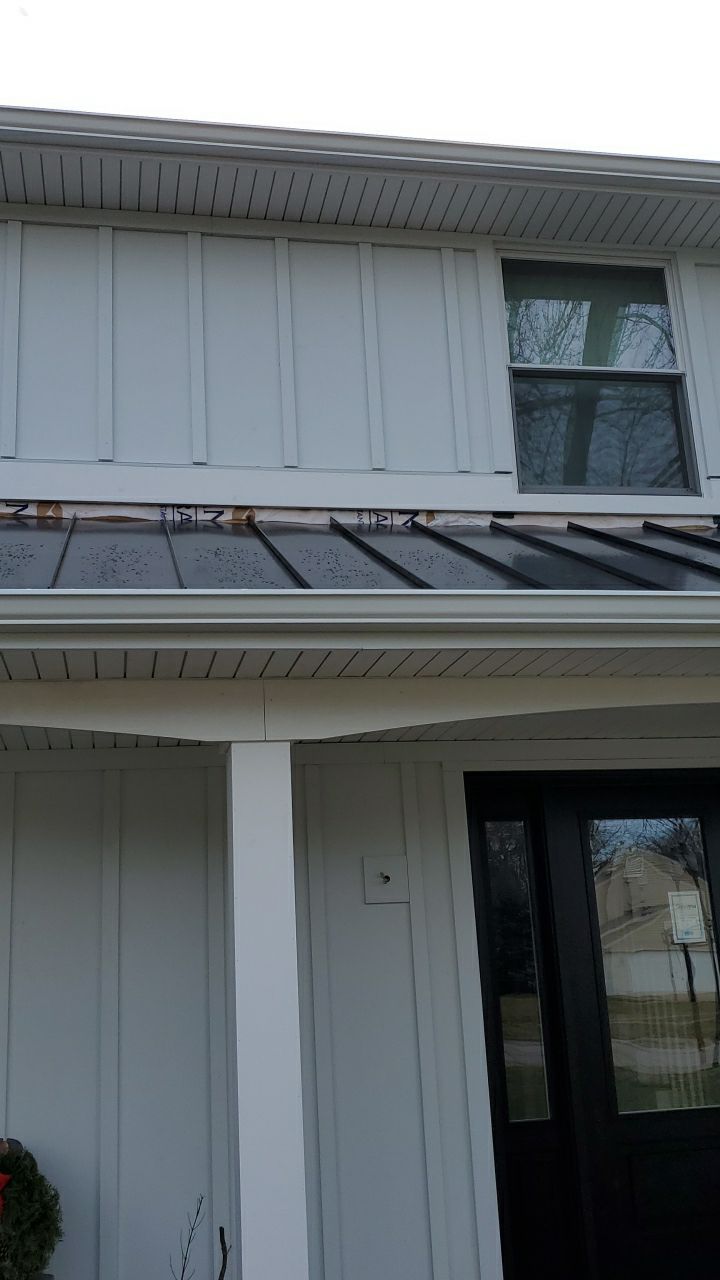 James Hardie Siding  using James Hardie Board and Batten, White by Absolute Roofing and Construction