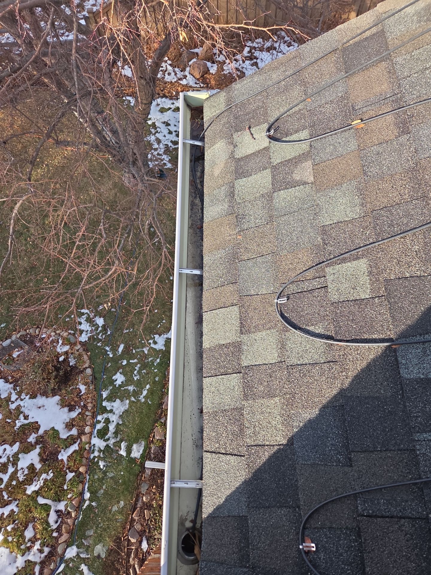   Clean Gutters and Downspouts by RTP Roofing Company