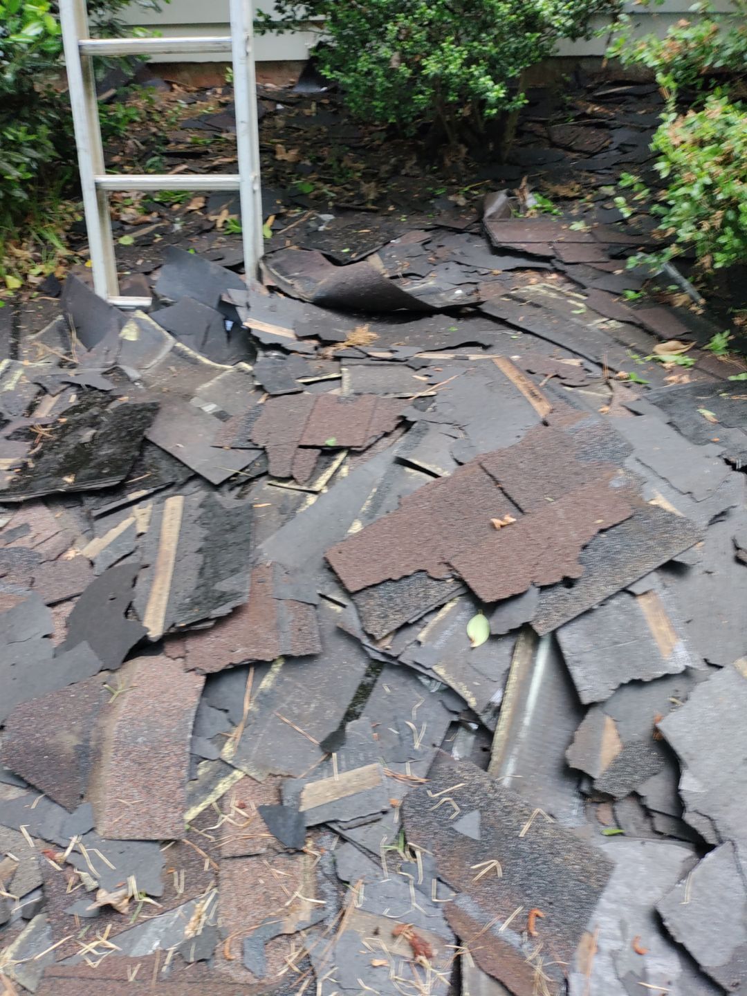 Residential Roof Replacement using Owens Corning Trudef Twilight Black by Inspector Roofing and Restoration