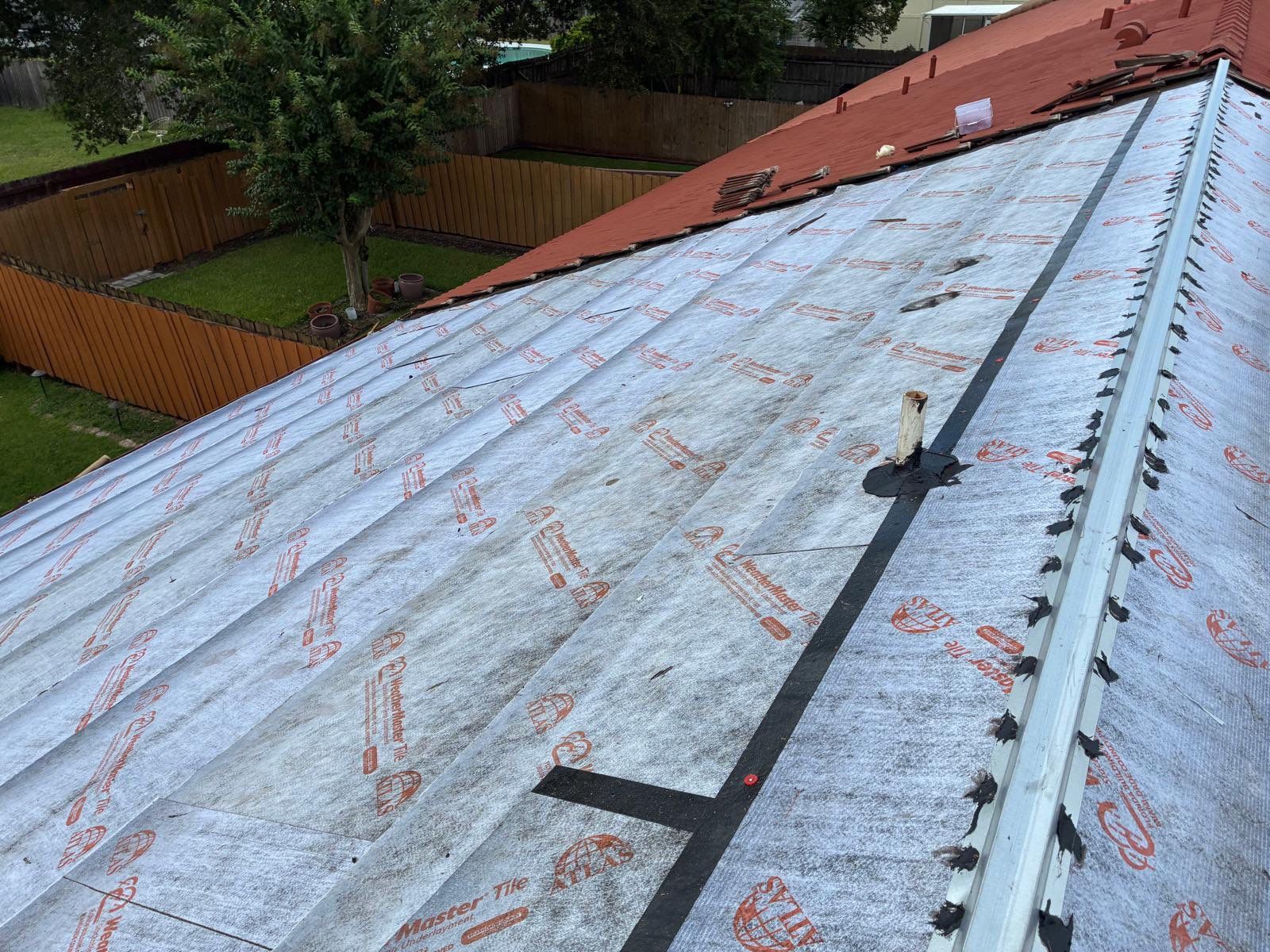 Residential Tile Roof Replacement and Gutter Installation in Winter Park by Pinnacle Roofing Group