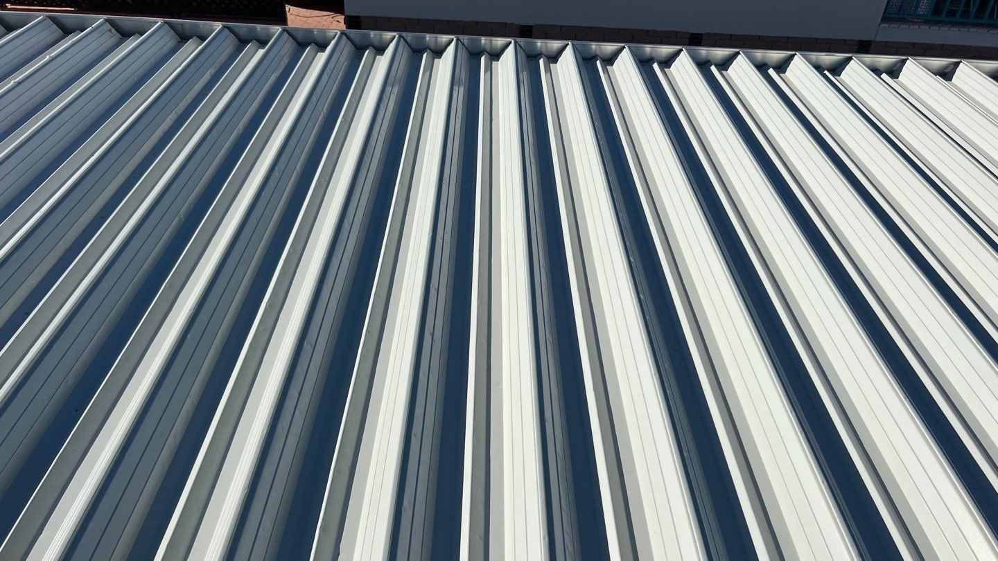 Polar White Exposed Fastener  by Reimagine Roofing