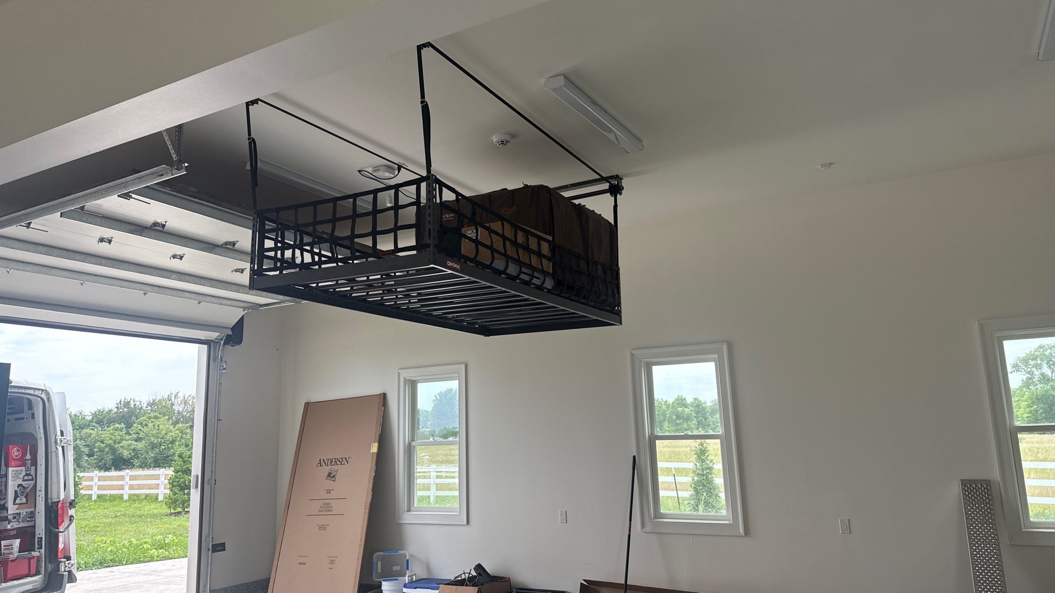 Mark Added Storage Plus A Motorized Lift  by Banner Garage