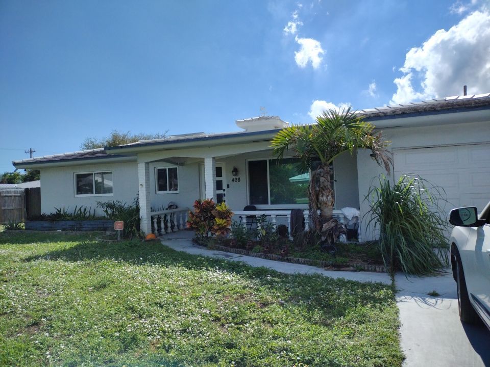 Residential Roofing Installation using 1" Nail strip metal roof by BLUES BROTHERS CONSTRUCTION CORP
