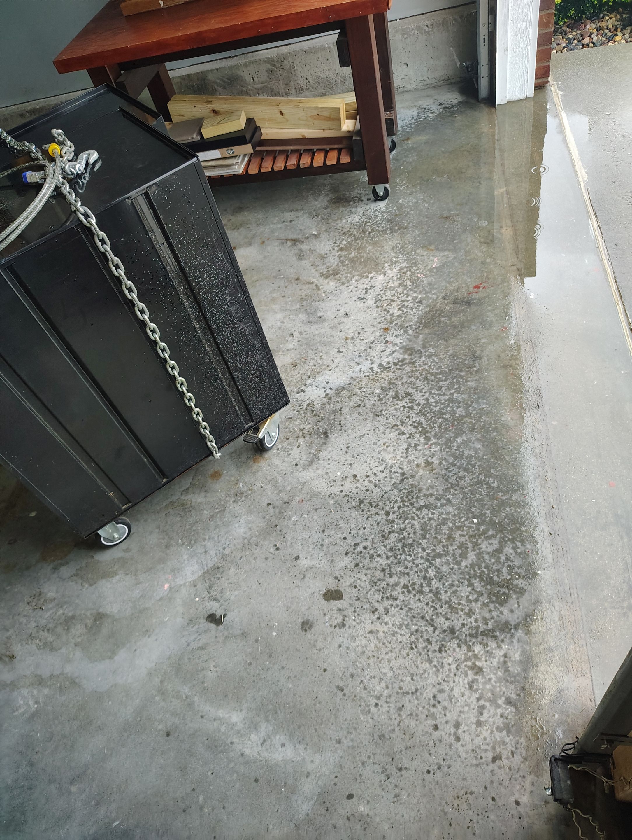 High-Gloss Epoxy Garage Floor Coating in Sioux Falls by Select Painting, Coatings & Garage Cabinets
