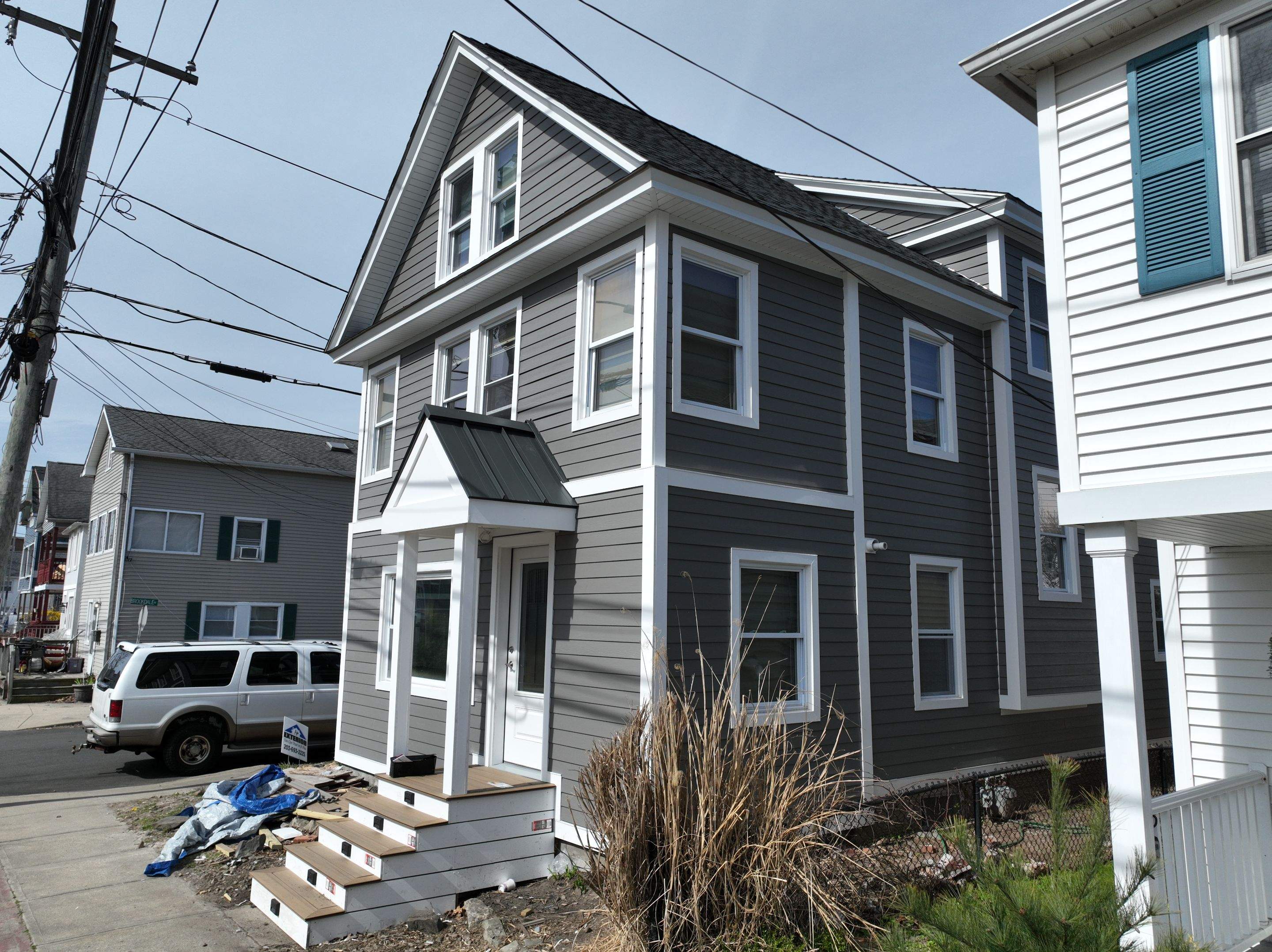Siding Installation using Hardie Plank Aged Pewter by A Plus Exterior