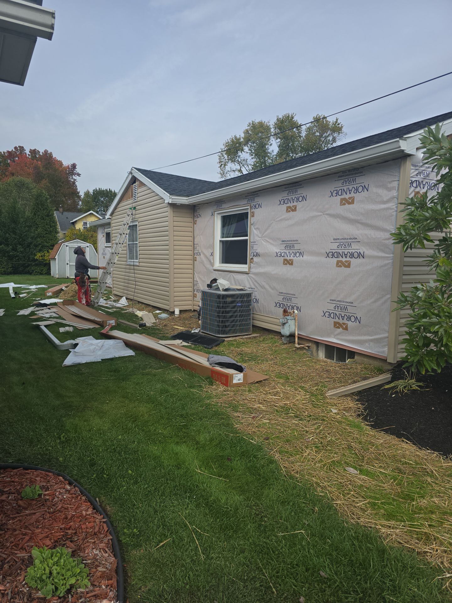 Siding Installation using Vinyl Siding by Rainstoppers Roofing