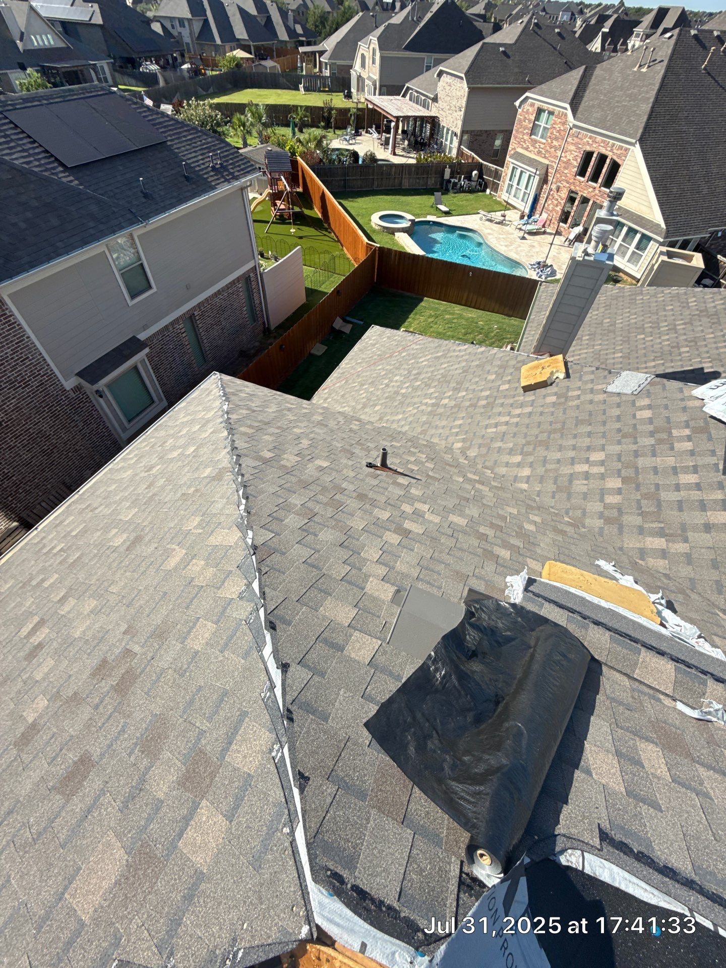 Residential Roof Replacement using ATLAS PROLAM WEATHER WOOD by Elite Roofing LLC