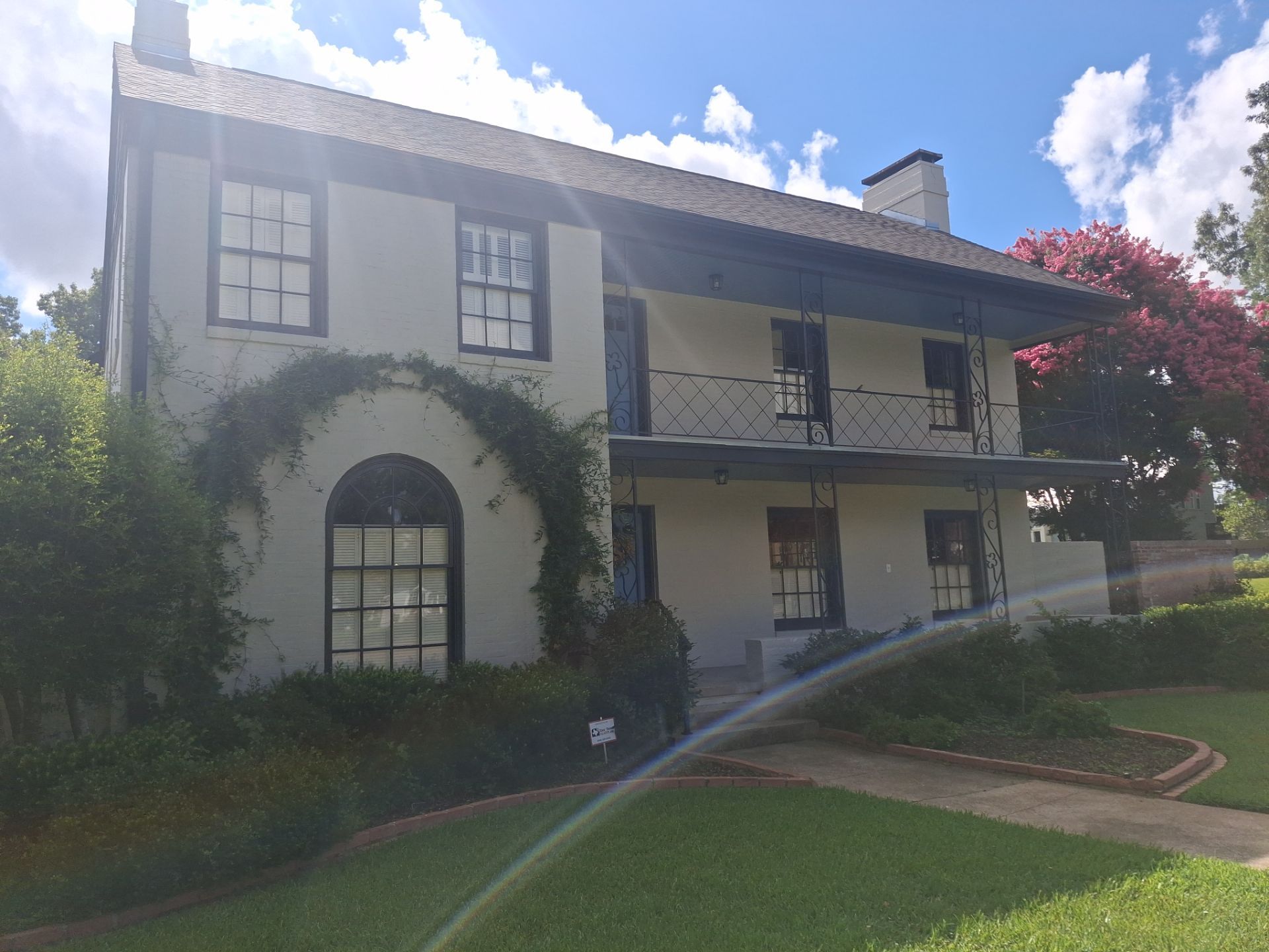 Exterior Painting in Tyler, TX | White Brick Home with Sherwin-Williams Duration by Quality Coats Painting