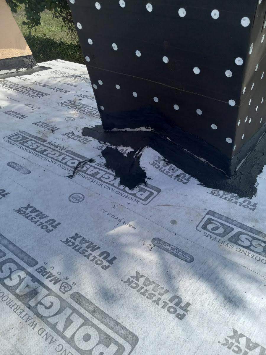 Complete Chimney Rebuild + Tile & Flat Re-Roof  by Morton Roofing, Inc.
