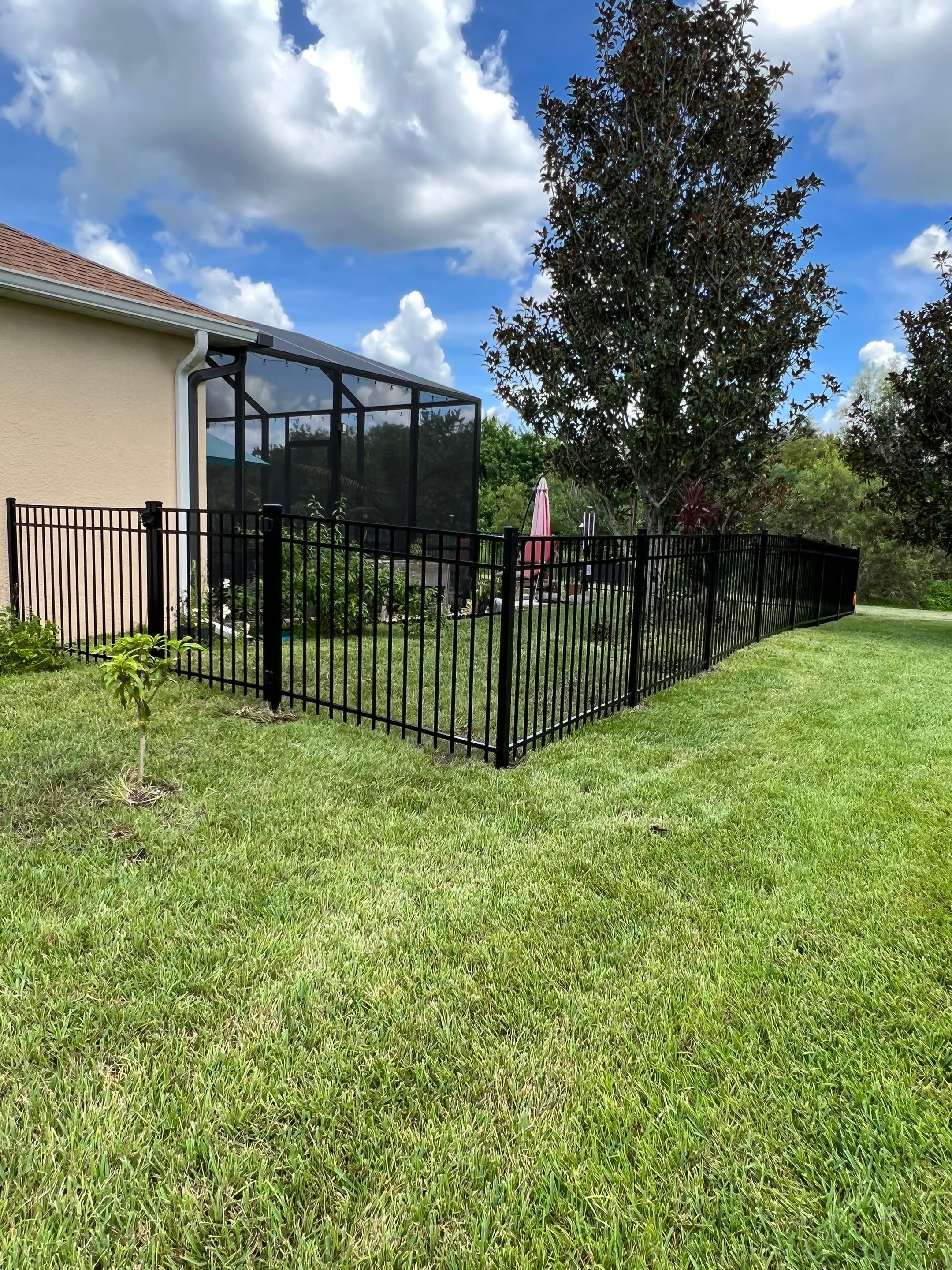 Black Aluminum Fence Installation in Bradenton, FL by Asap fence and gates, LLC