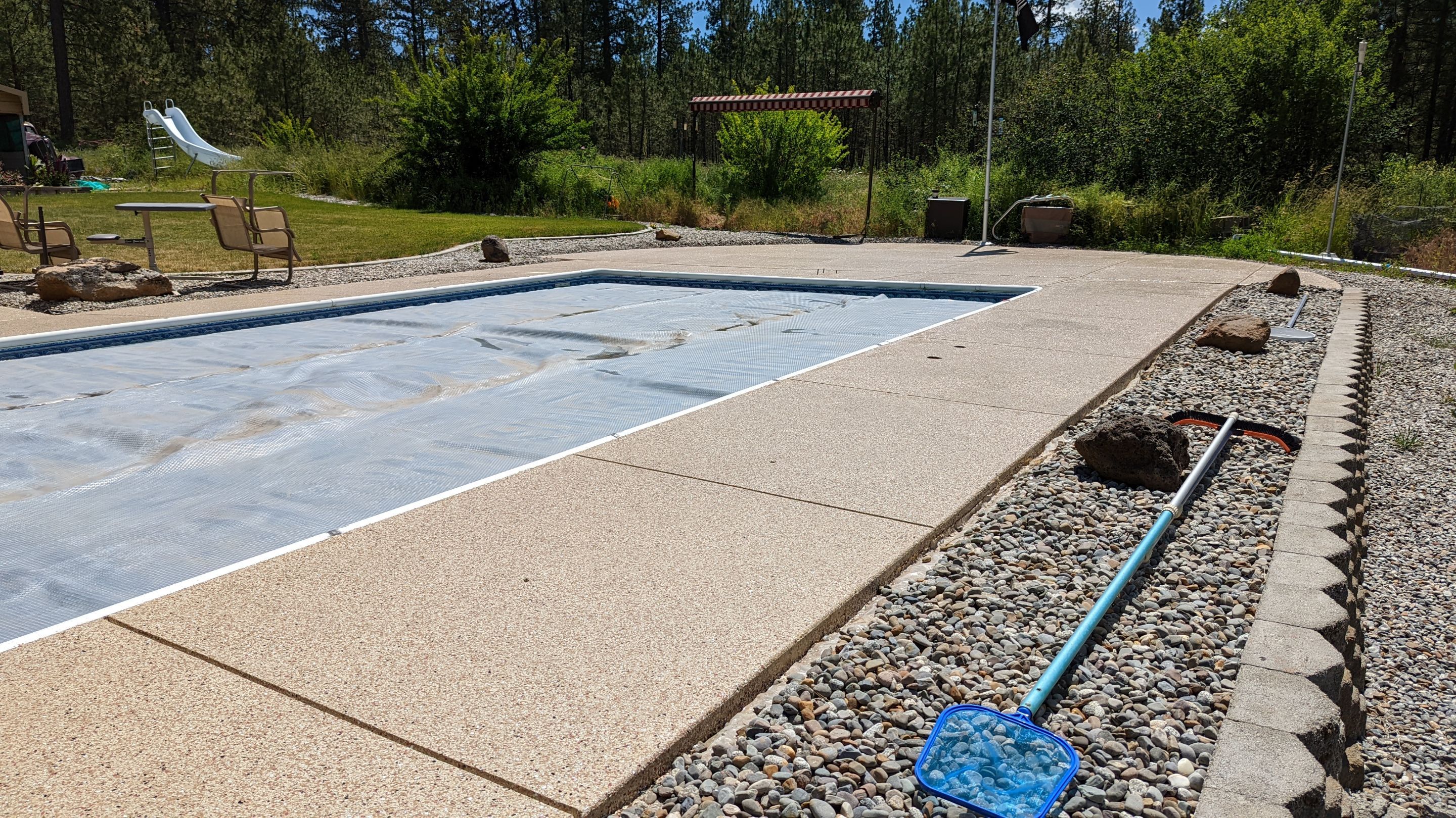 Garage Transformation using Domino for Garage and Pecan for Pool Deck by Croc Coatings, LLC