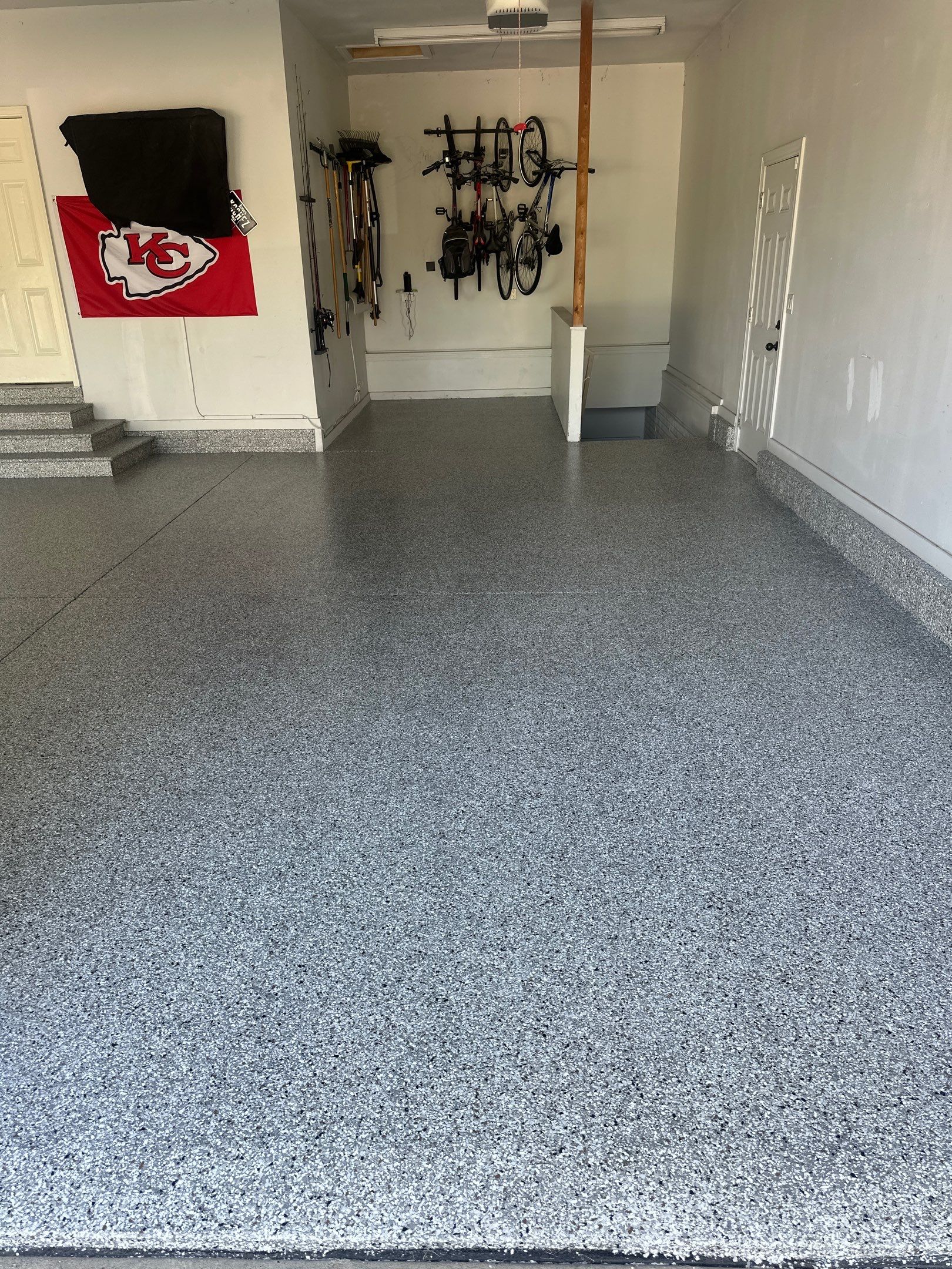 Perfect Garage for Chiefs Gameday ❤️💛 by Revival Concrete Coatings, LLC
