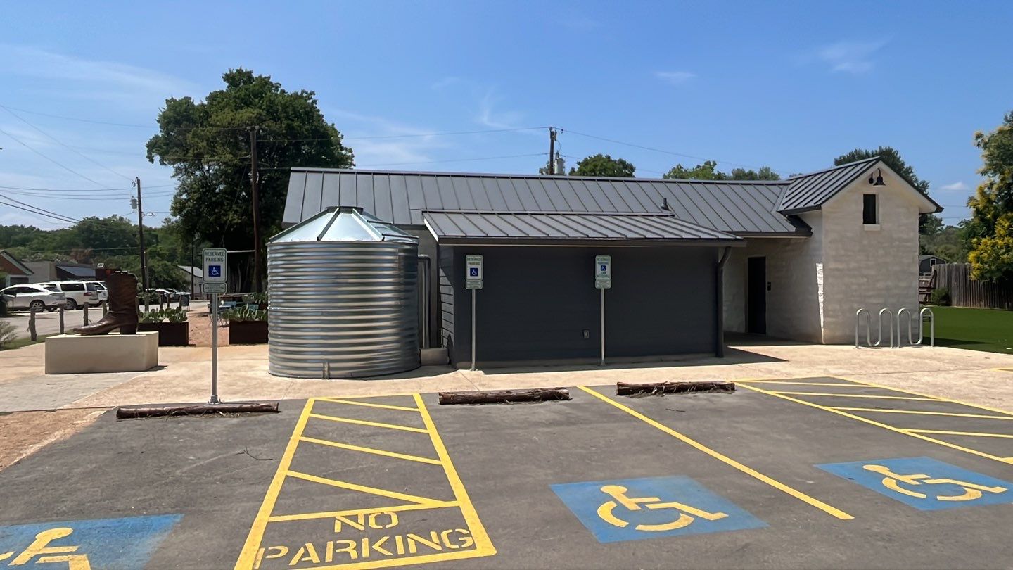5000 gallon Wimberley Community Welcome Center using Meridian 5000 gallon, 30 degree pitched roof, silo style by Hill Country Rain Water