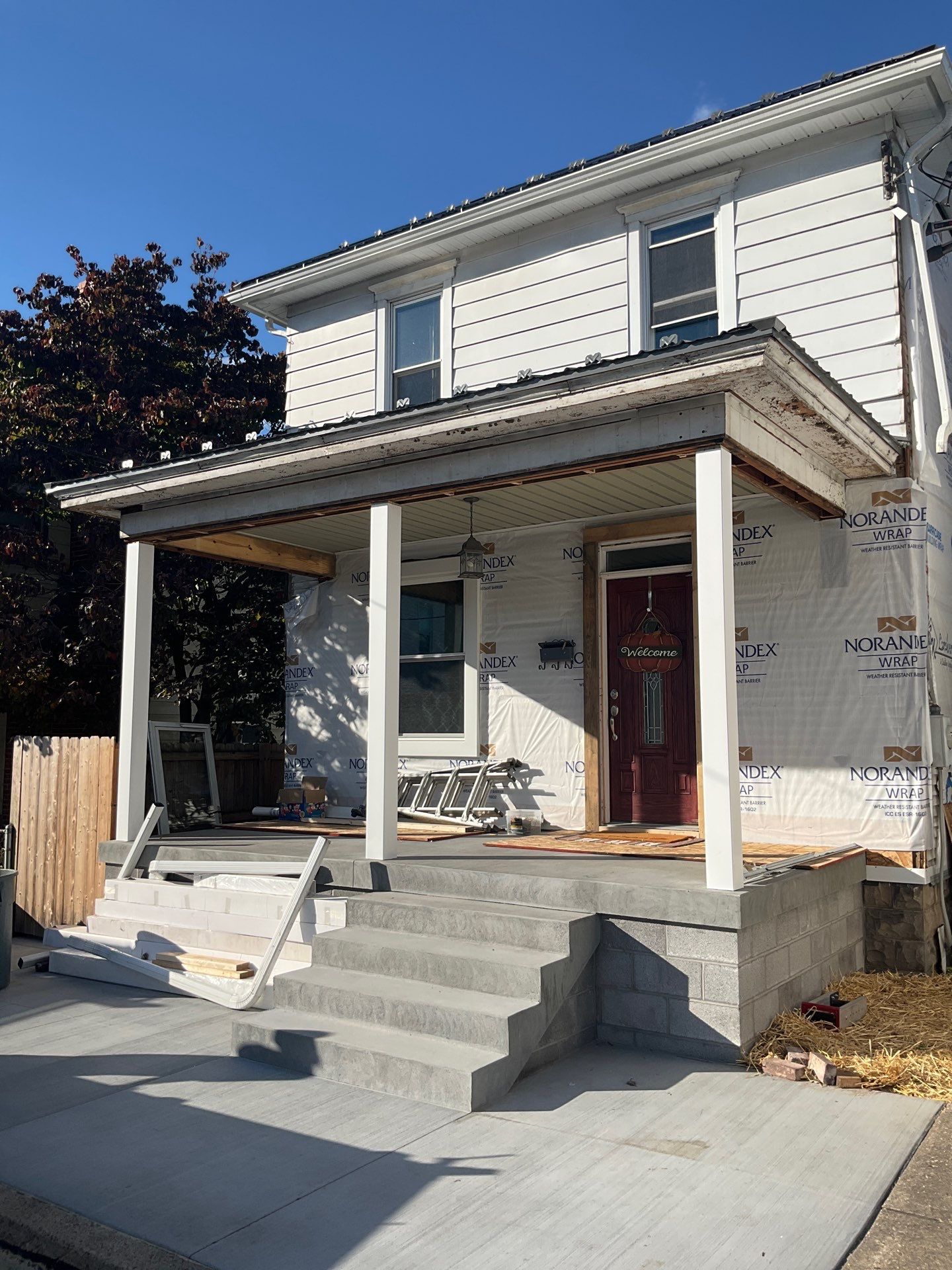 Charcoal Metal Roof & Blue Siding — A Refreshing New Look by Esh Builders