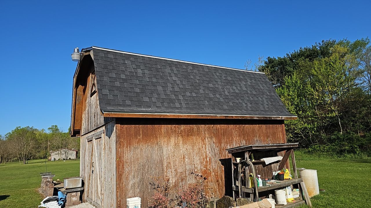 ATLAS PINNACLE COLOR: BLACK SHADOW DRIP EDGE: WHITE by Eagle Eye Roofing