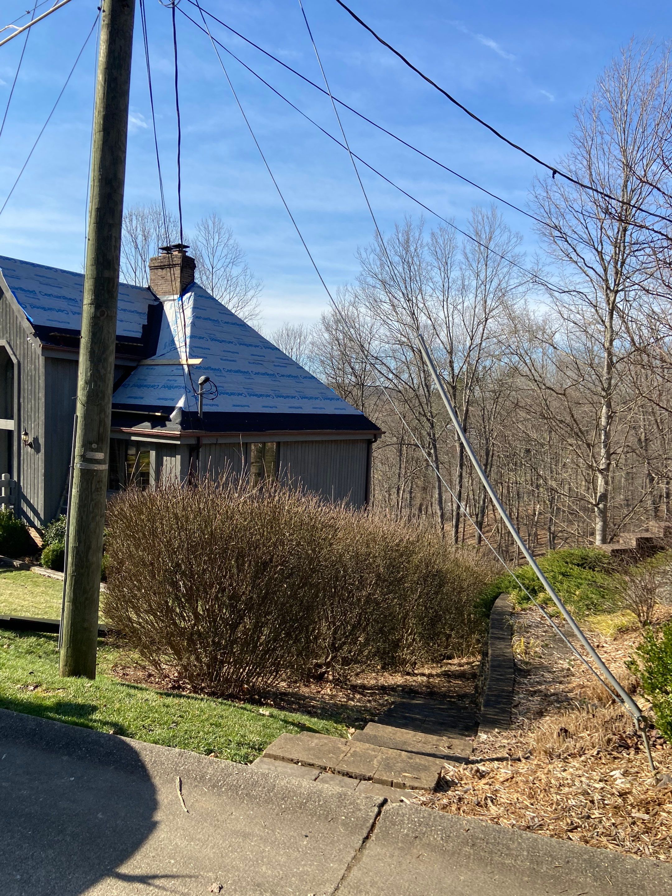 Residential Roofing Installation using Certainteed Belmont Shingle in Black Granite by Secure Construction Company Inc