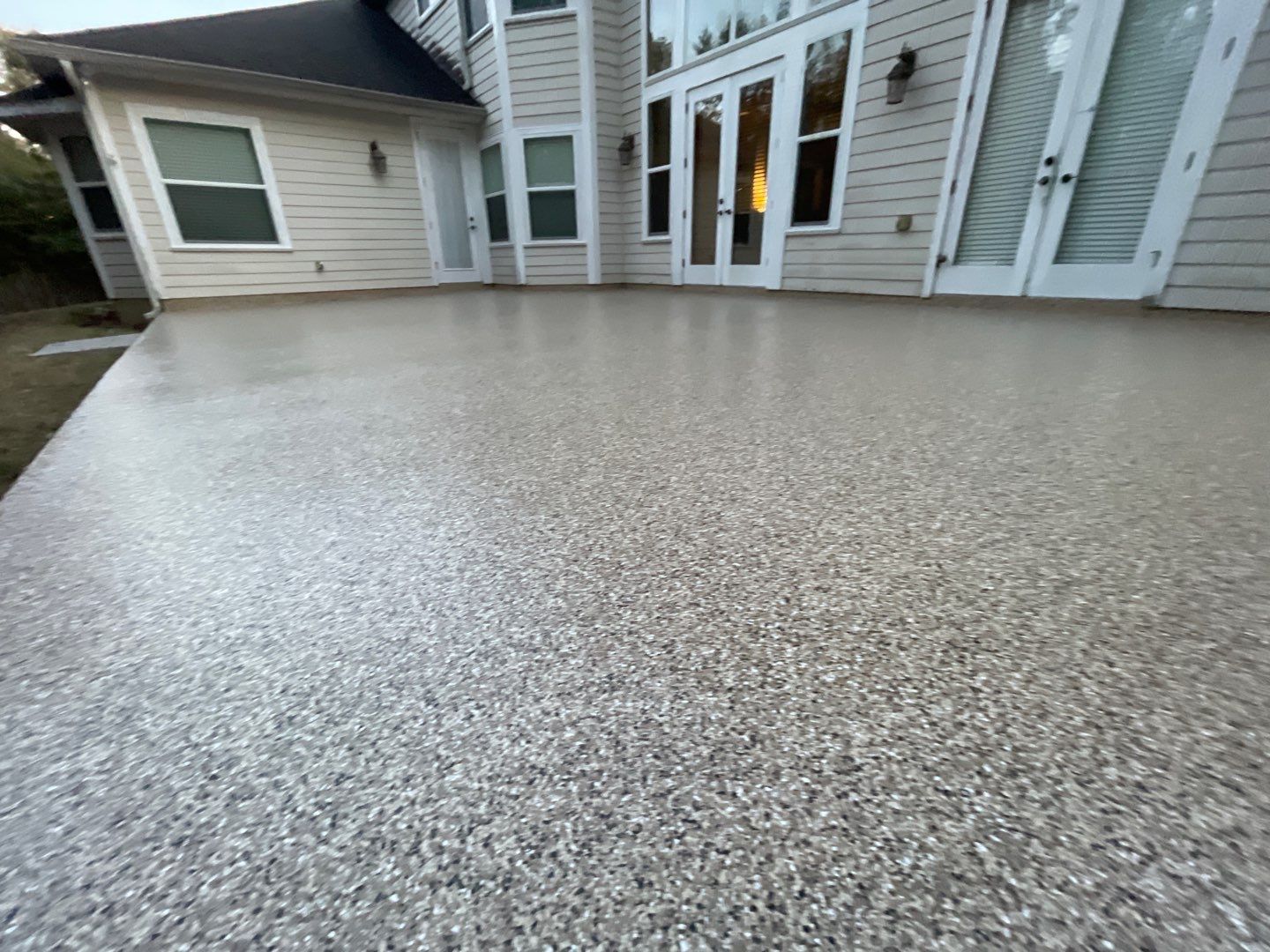 Patio  in Gainesville, FL in Sandstone by Cross Creek Concrete Coatings