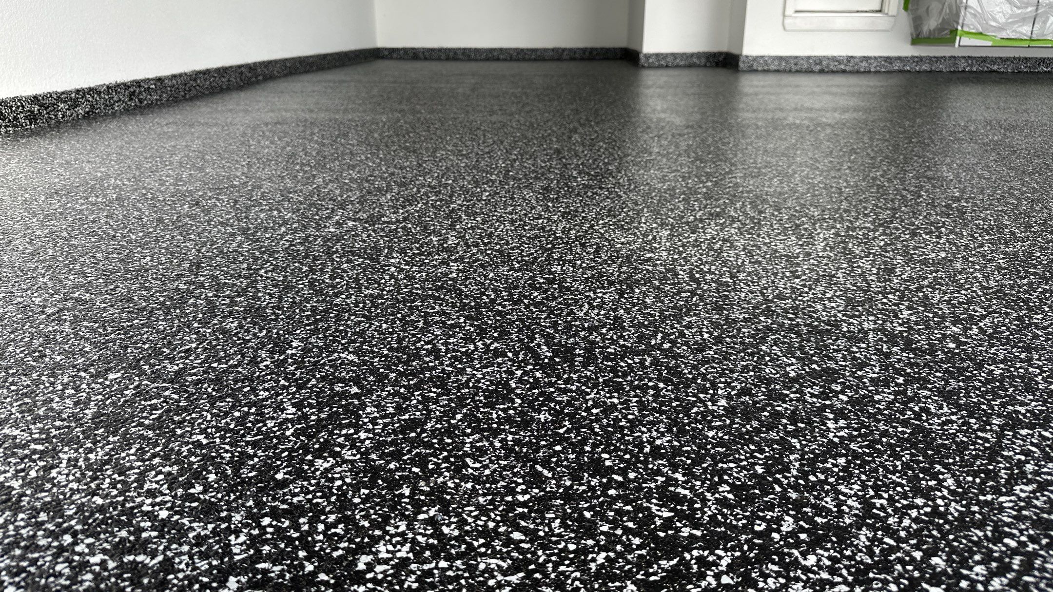 John H. received his dream garage with cabinets and a Banner Garage Floor by Banner Garage