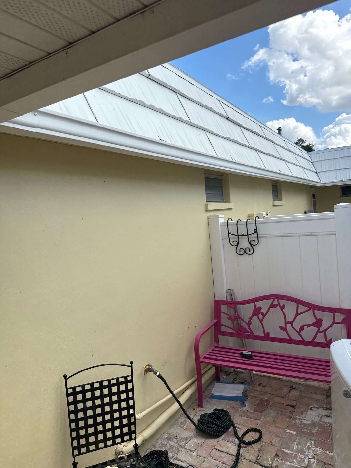 White Gutters and Matching Downspouts in Sarasota FL by Gutter Professors