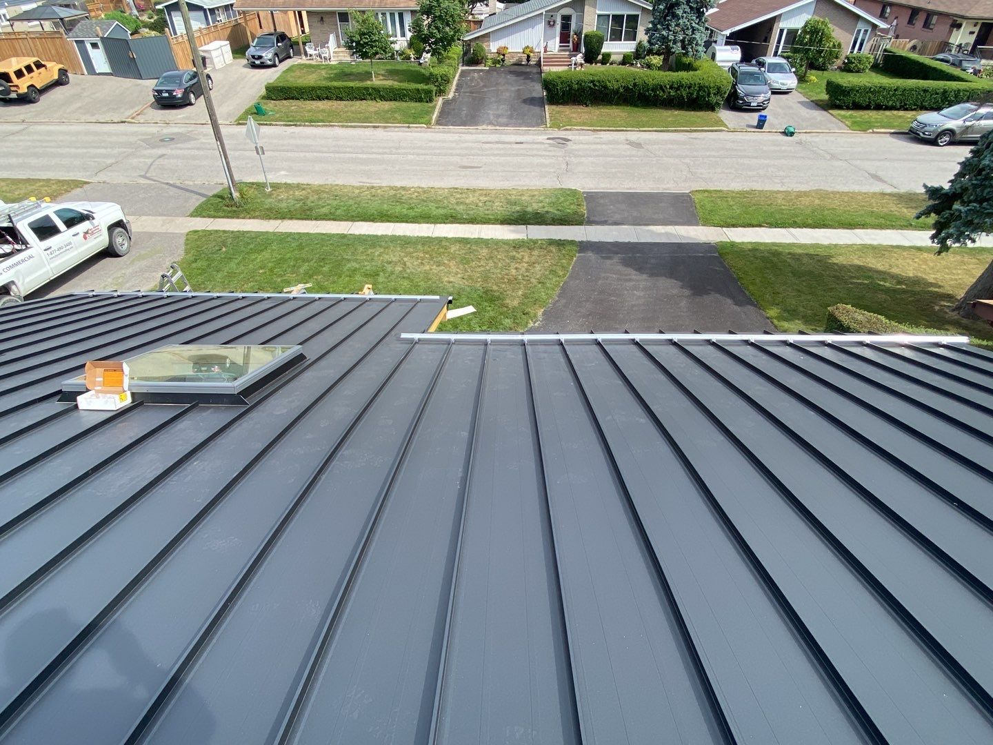 Residential Roofing Installation using 16" Standing Seam Panels by Jay Carter Roofing & Sheet Metal