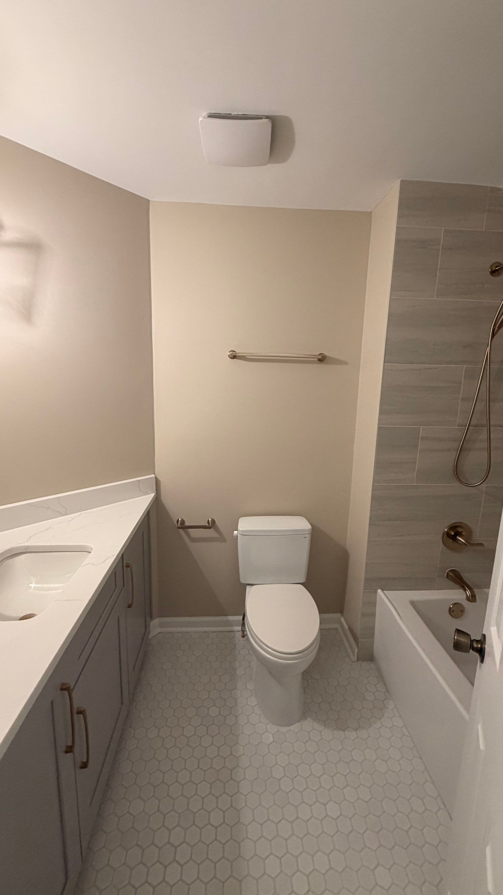 Modern Bathroom Remodel With Quartz Countertops and Hexagonal Tile in Acworth by Swift Home Renovations