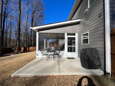 Screened-In Porch Construction With White Beadboard Ceiling In Cumming