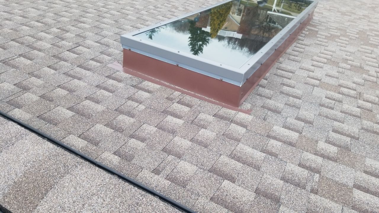 Skylight removal and install  by Absolute Roofing and Construction