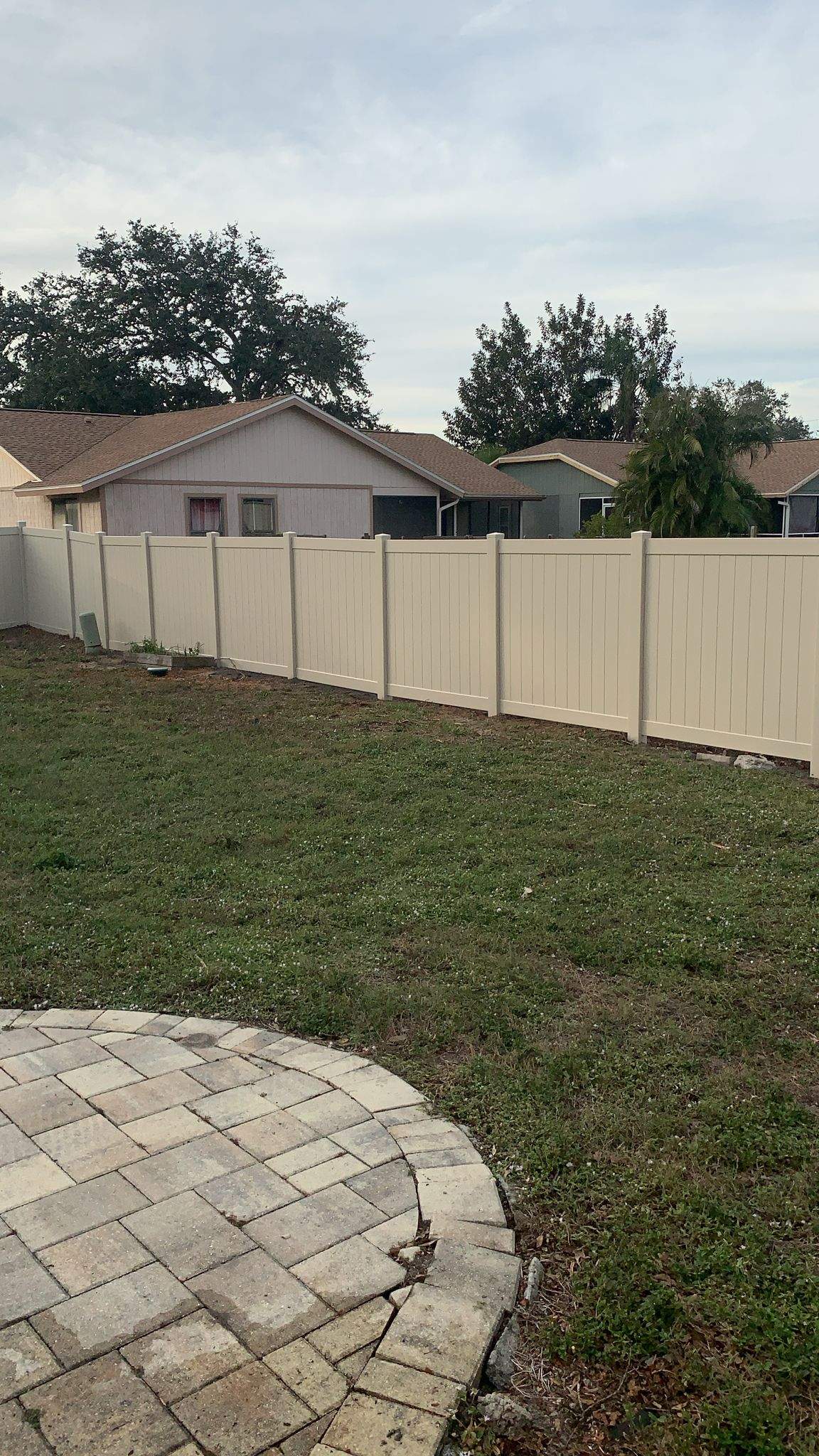 Vinyl Privacy Fence and Custom Paver Patio Installation in Lehigh Acres by True Fence LLC