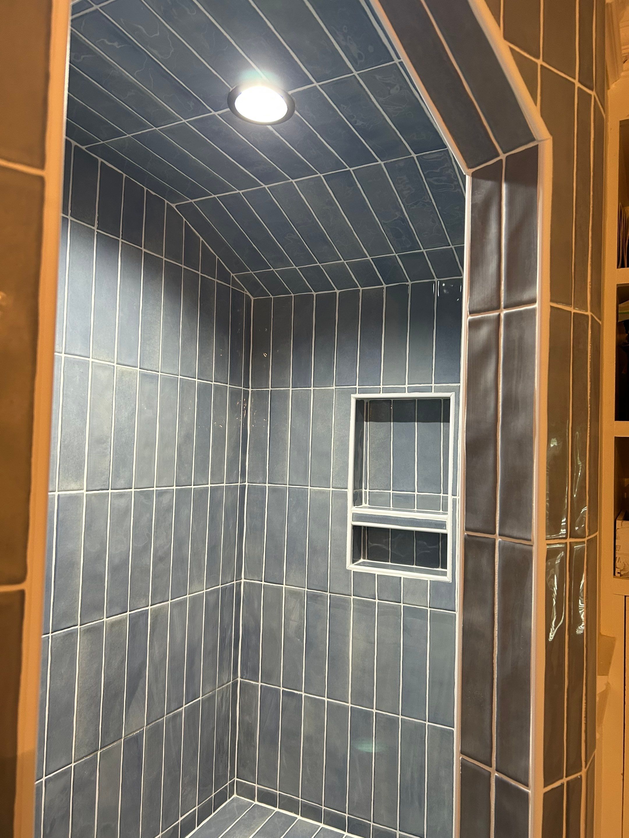 Tile shower and floor by Footprints Floors of Nashville