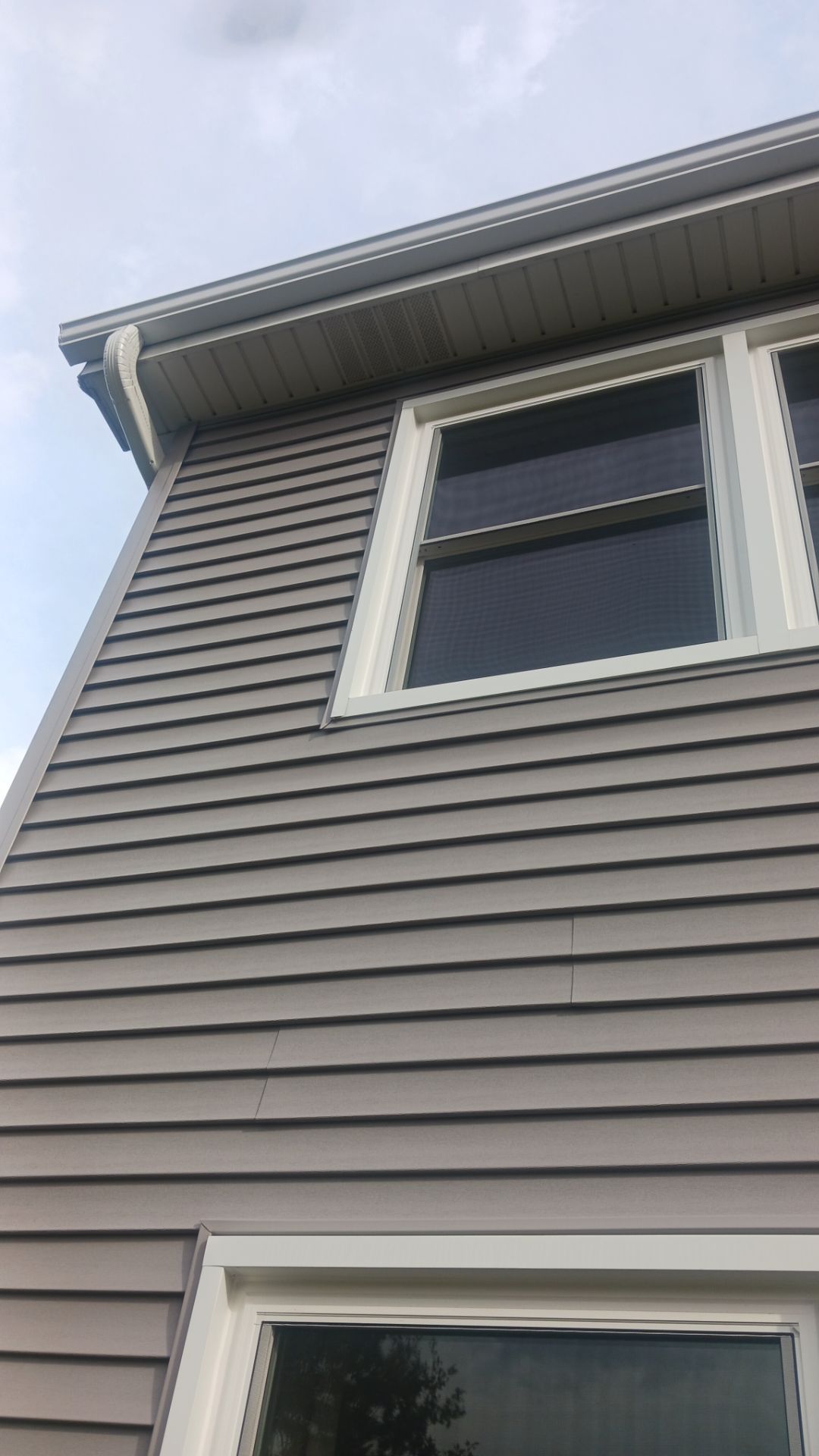 New Siding and Windows by NextWave Construction