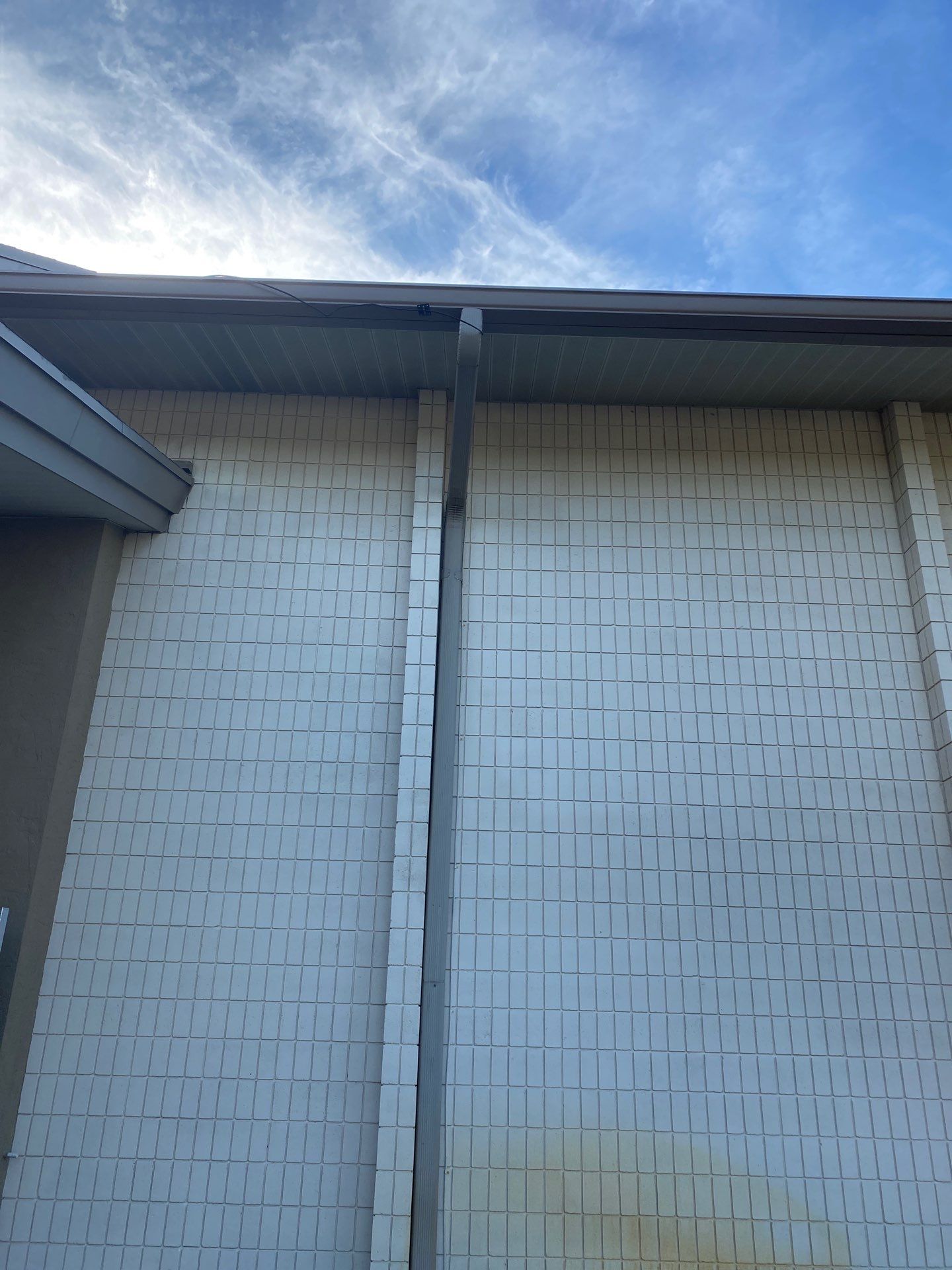 Grey Aluminum Gutters with Downspouts in Sarasota FL by Gutter Professors