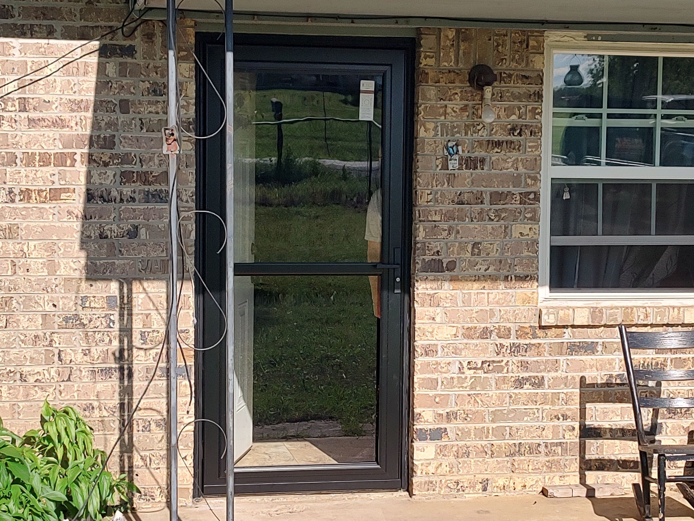 Roof replacement & Storm Door by In & Out Construction & Remodeling, LLC