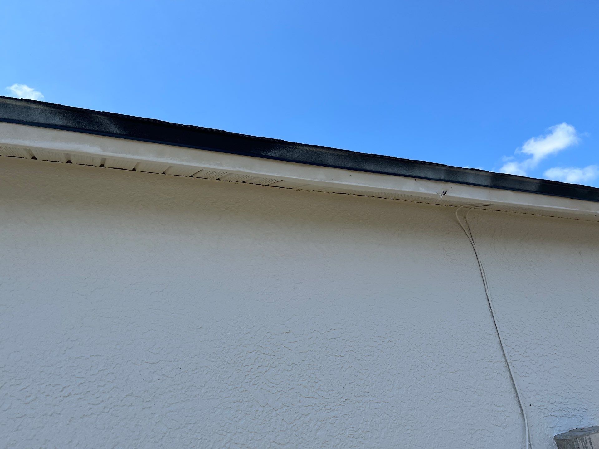 Black Seamless Gutters and Downspouts in Fort Myers FL by Gutter Professors