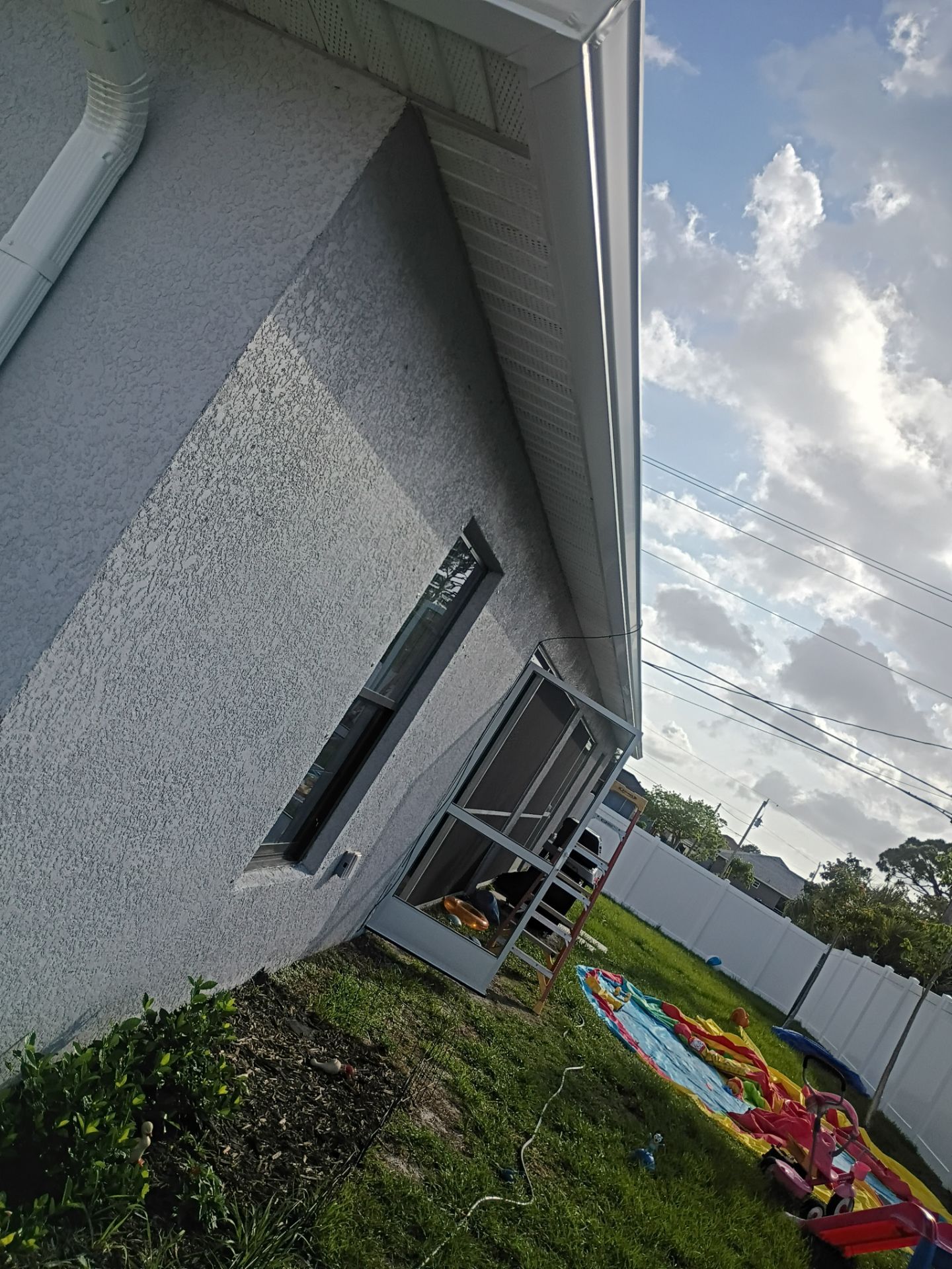 Seamless Aluminum Gutter Installation using K-Style Seamless Gutters in Cape Coral FL by Gutter Professors