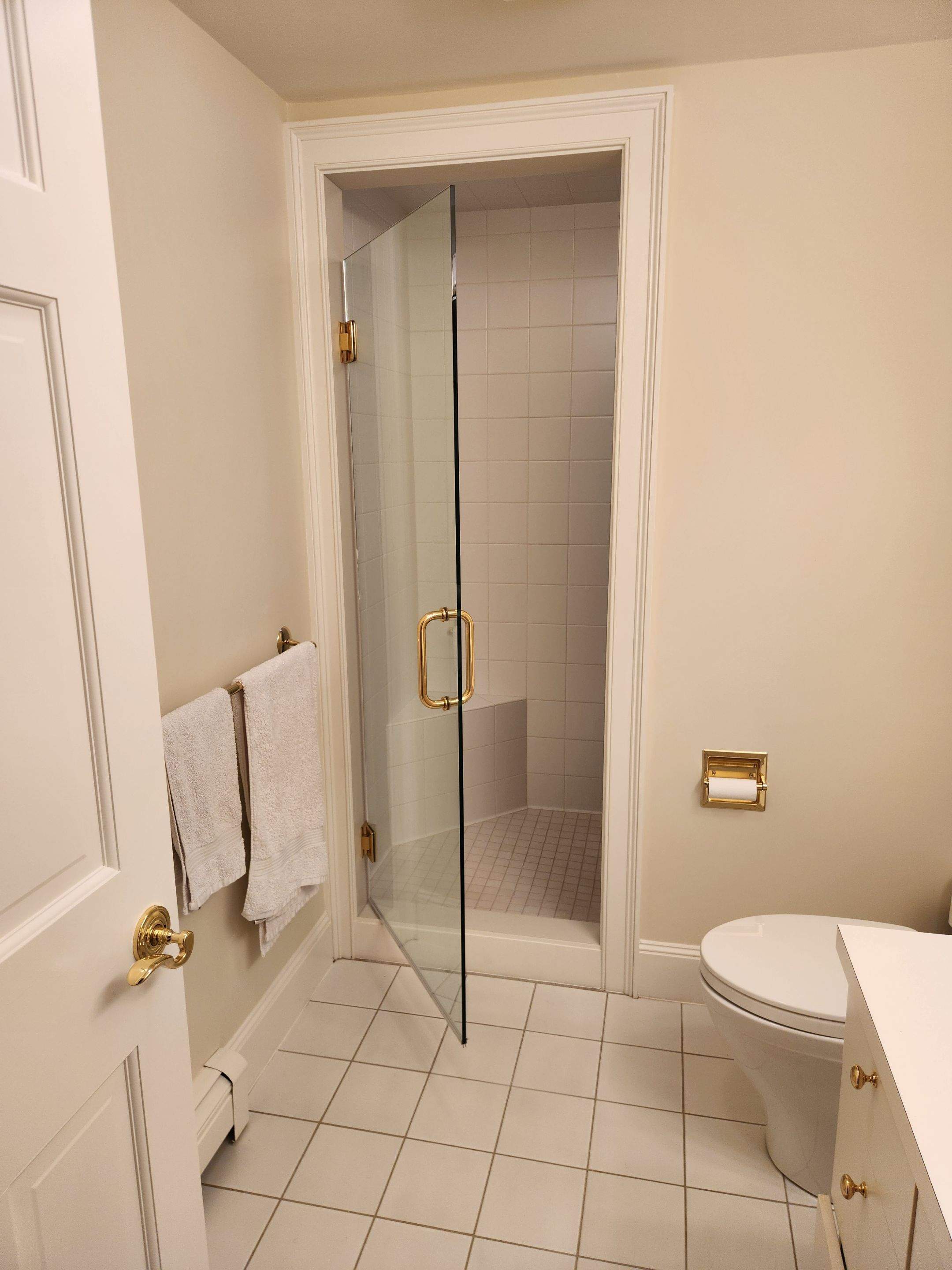 Multiple Frameless Shower Doors by Cheshire Glass Company