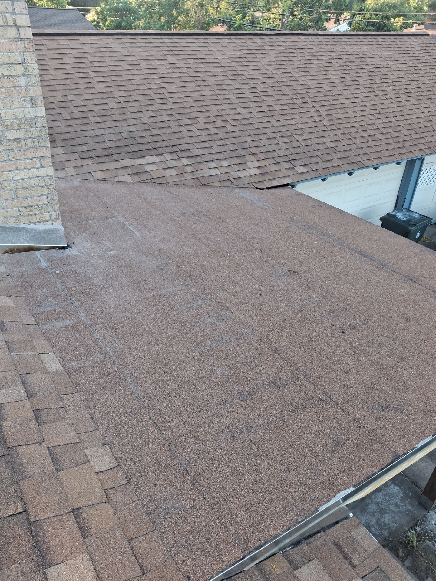 Chimneys need a Cricket.  by Bayfront Roofing and Construction