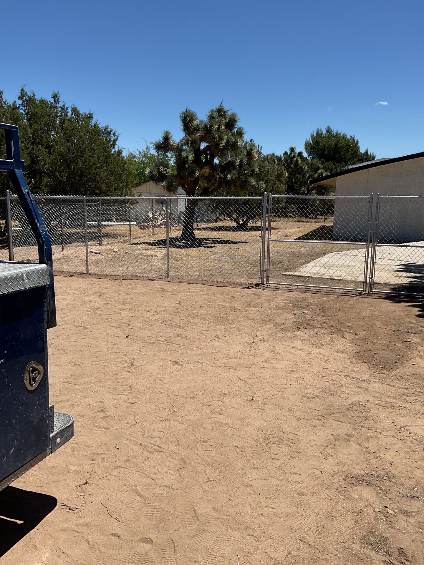 Chain link gate installation using chain -link by Fence Guys Inc. 