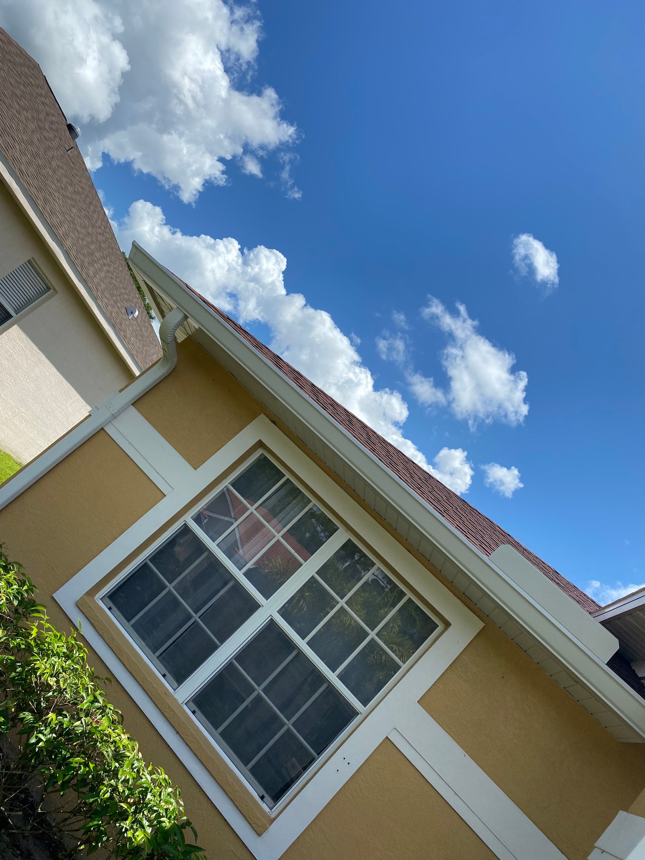 With 6-inch seamless gutters by Gutter Professor FL by Gutter Professors