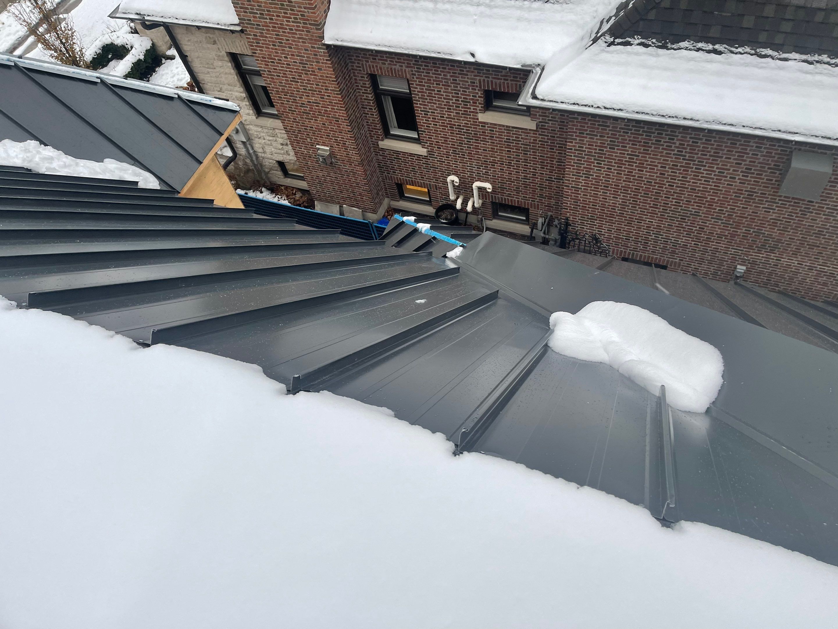 New Home Construction using 16" Standing Seam Panels by Jay Carter Roofing & Sheet Metal