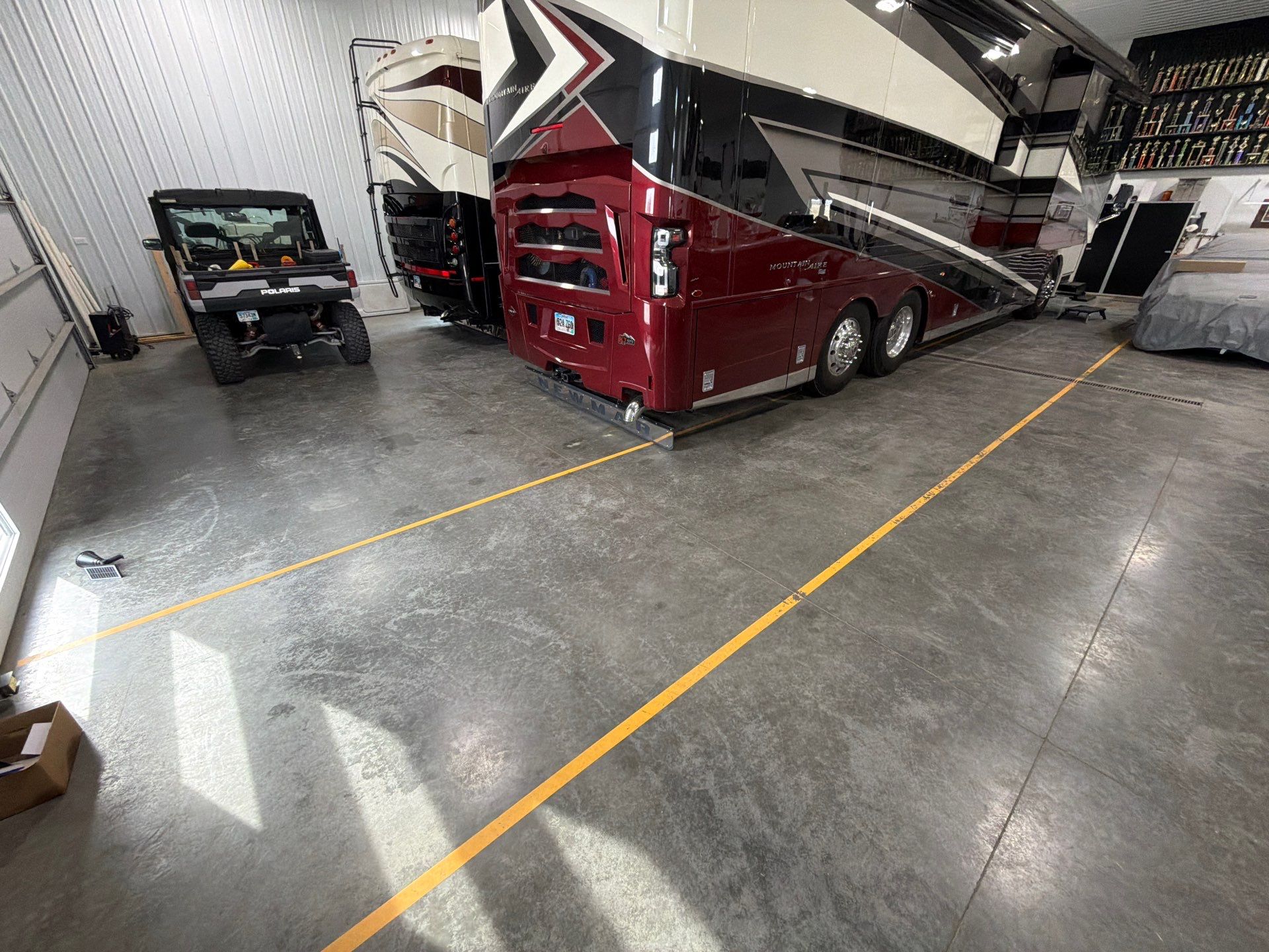 Multi-Stage Concrete Floor Coating for Egan Shop and RV Storage by Select Painting, Coatings & Garage Cabinets