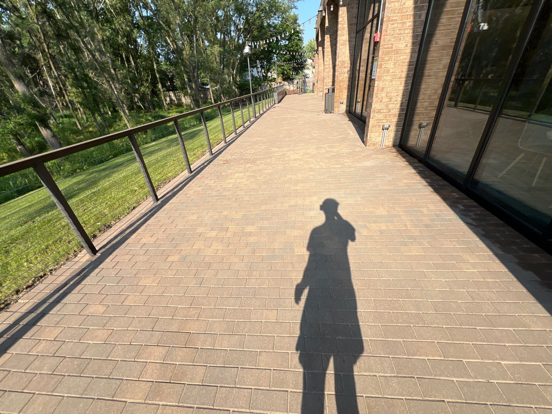 Brick paver repair, cleaning, sealing and poly sanding by Northern Power Washing LLC.