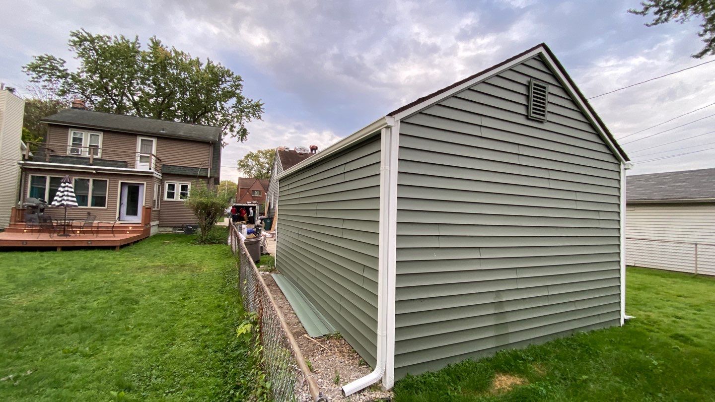 Siding Replacement using CertainTeed Restoration Classic D5 Forest Green by 180 Contractors