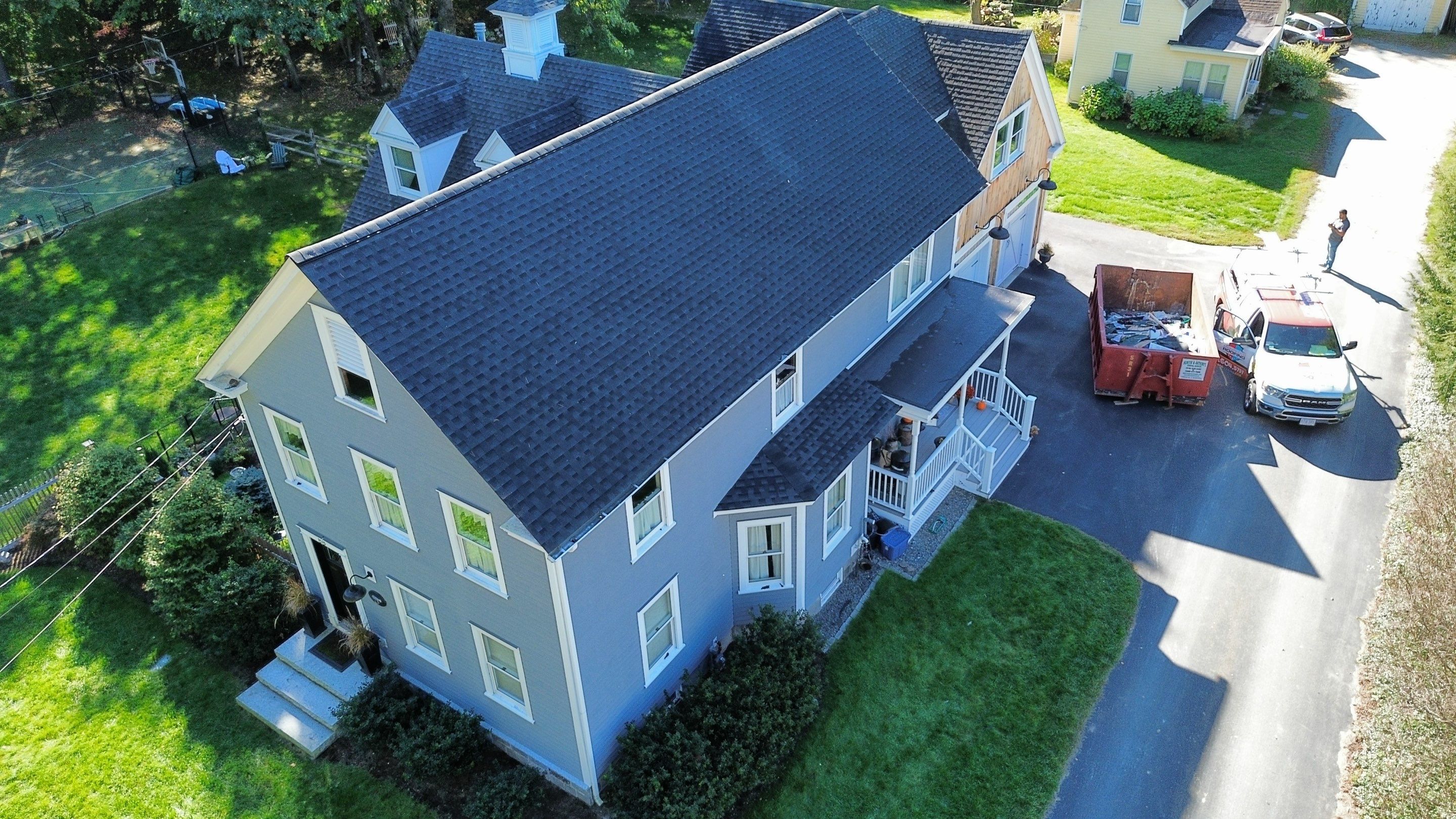 Roof Replacement & Chimney Removal – Westford, MA by Mighty Dog Roofing of Greater Middlesex County