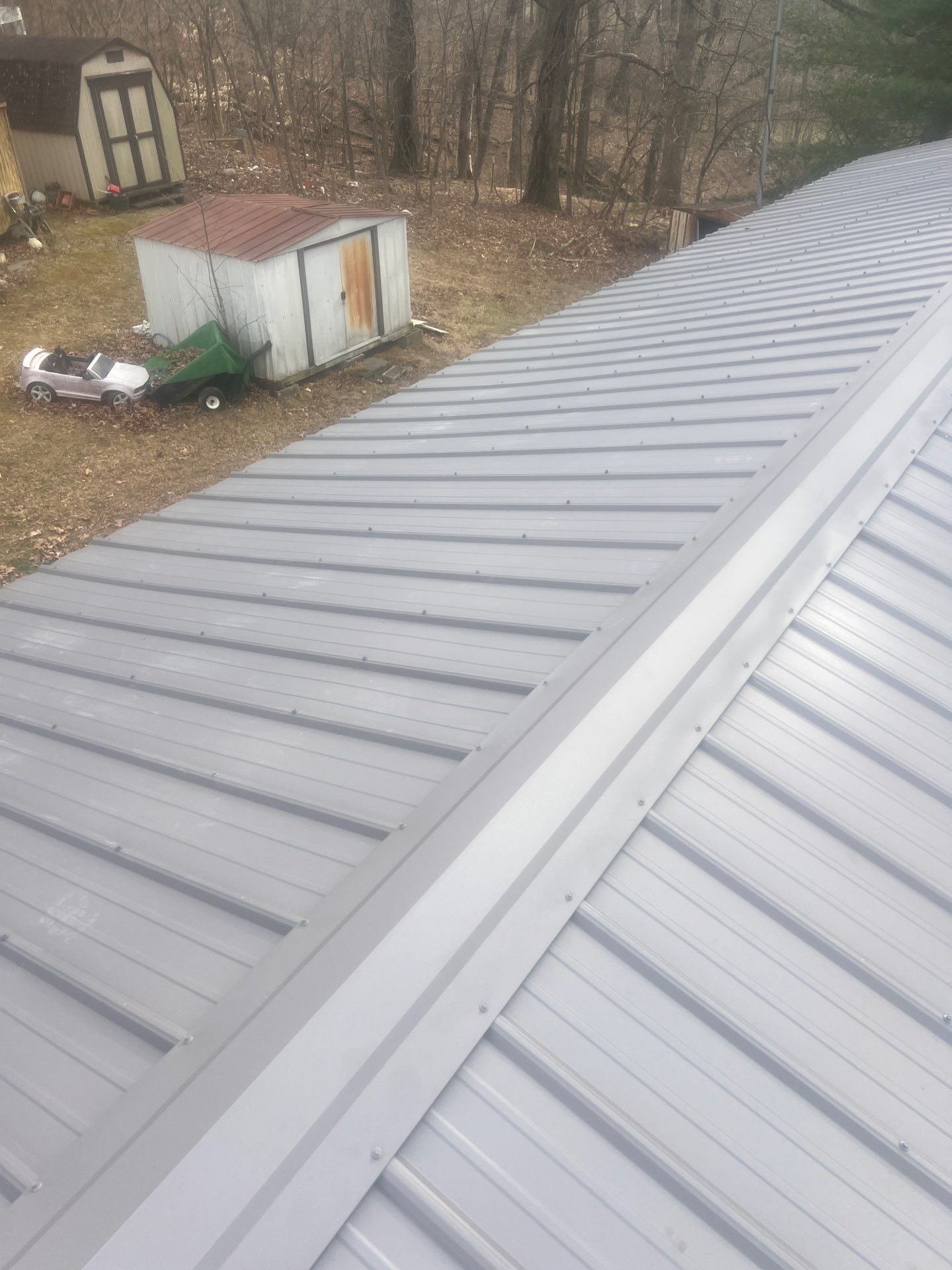Textured Charcoal Gray using 29 Gauge AG Panel by Omnia Roofing